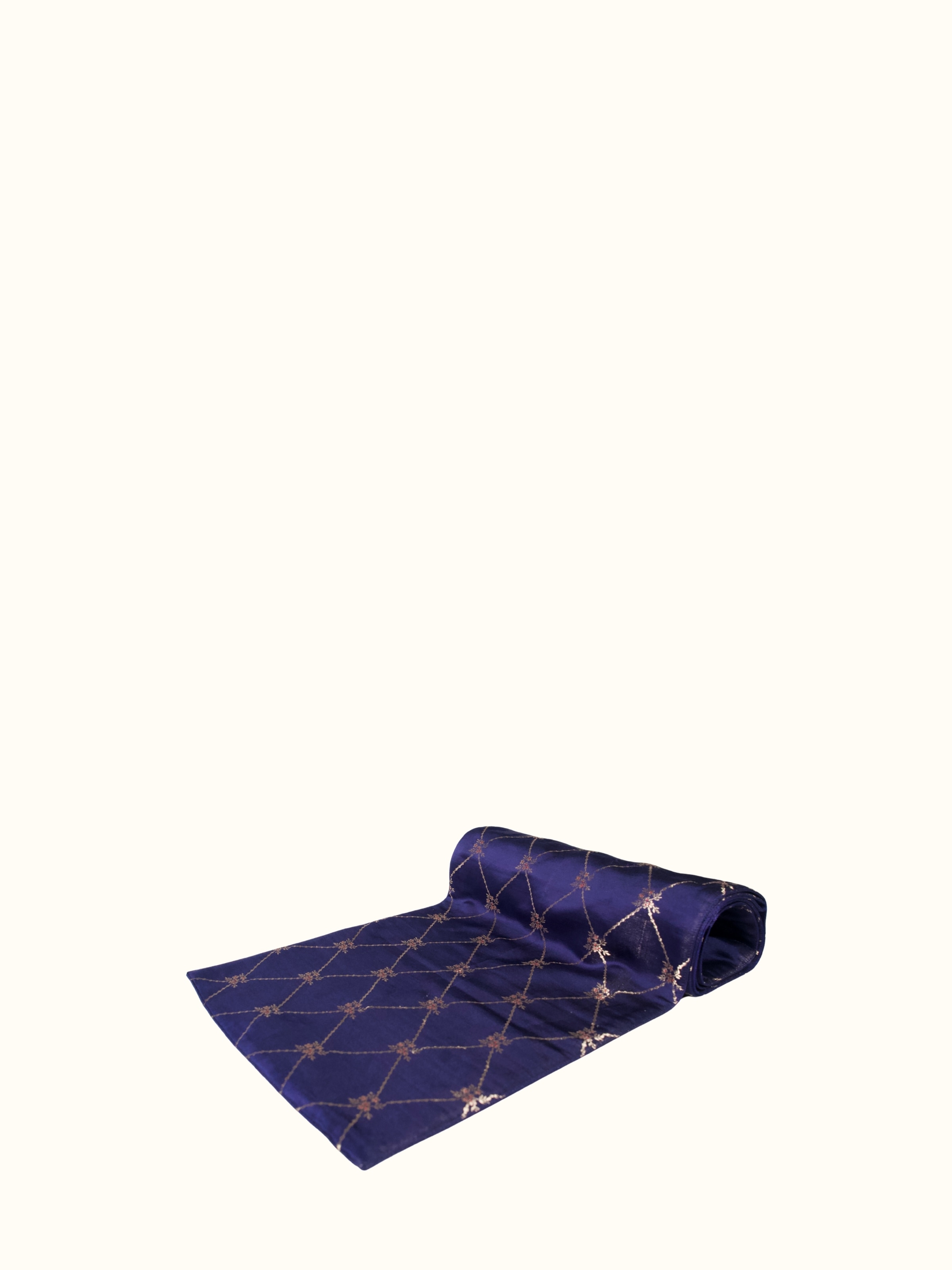 Angled close view of navy blue Banarasi brocade table runner