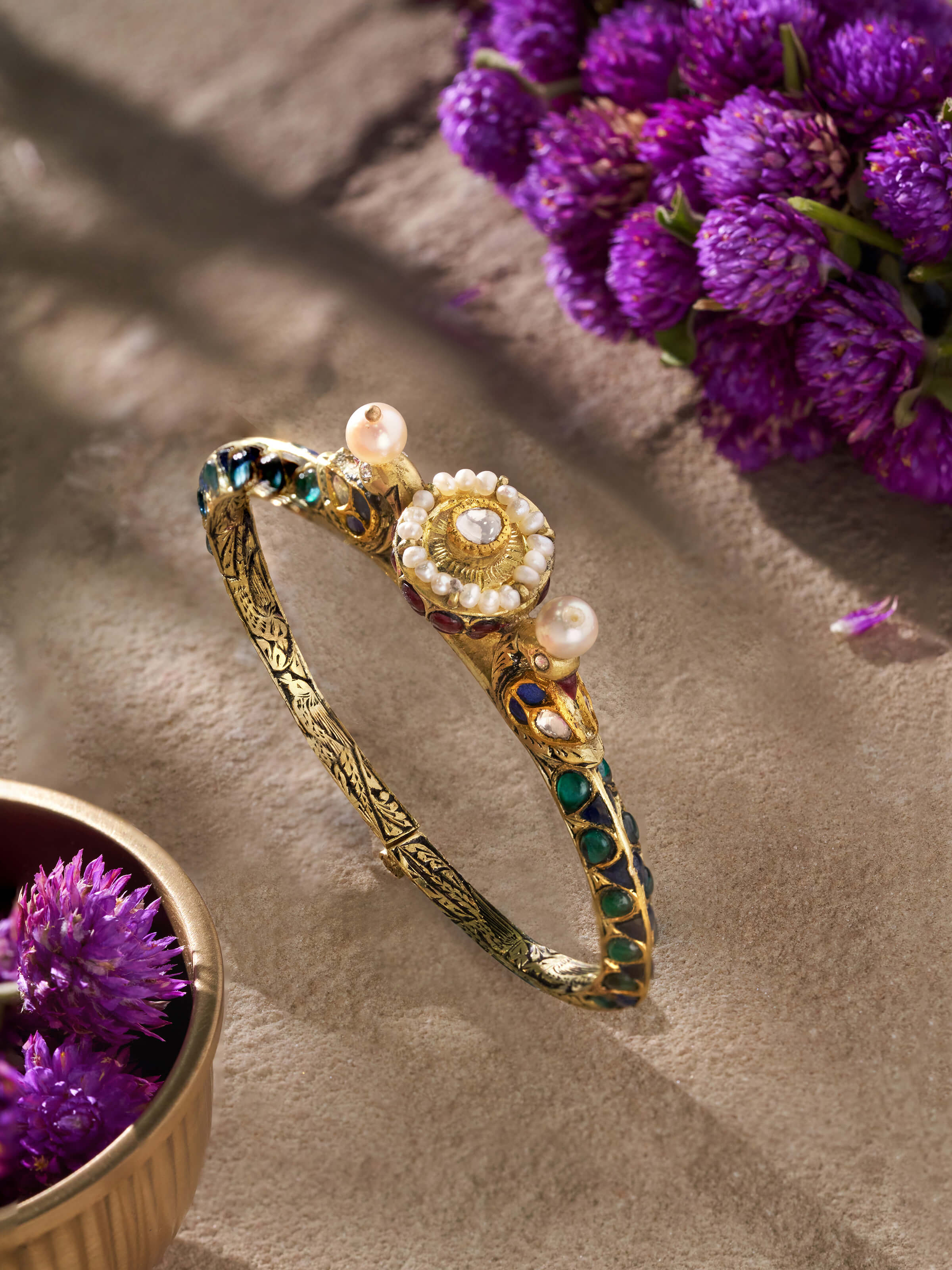 Close-up view of Partash 18 karat gold bangle focusing on its refined craftsmanship and elegant design