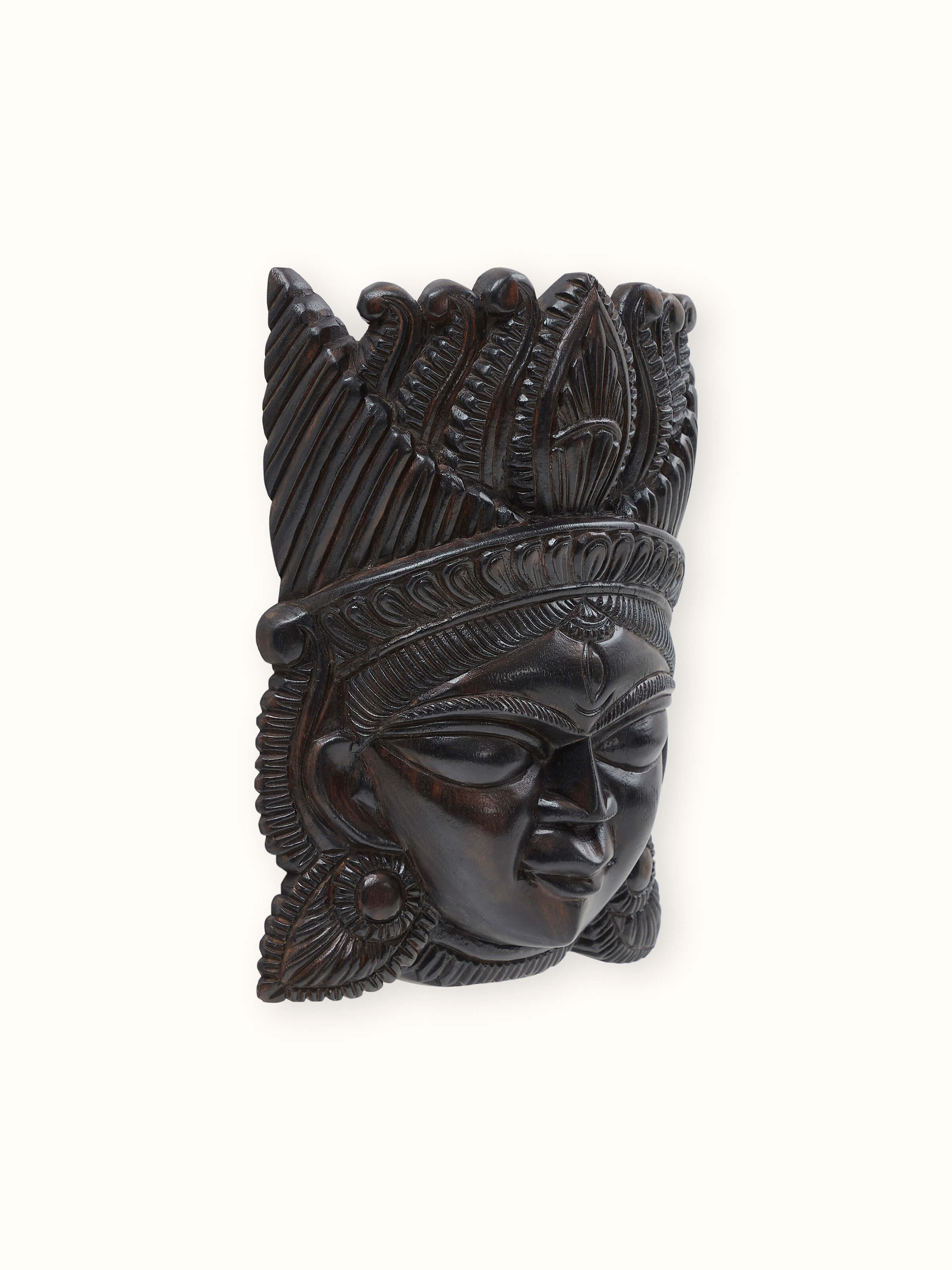 Lifestyle view of Kushmandi goddess wall mask handcrafted wall decor