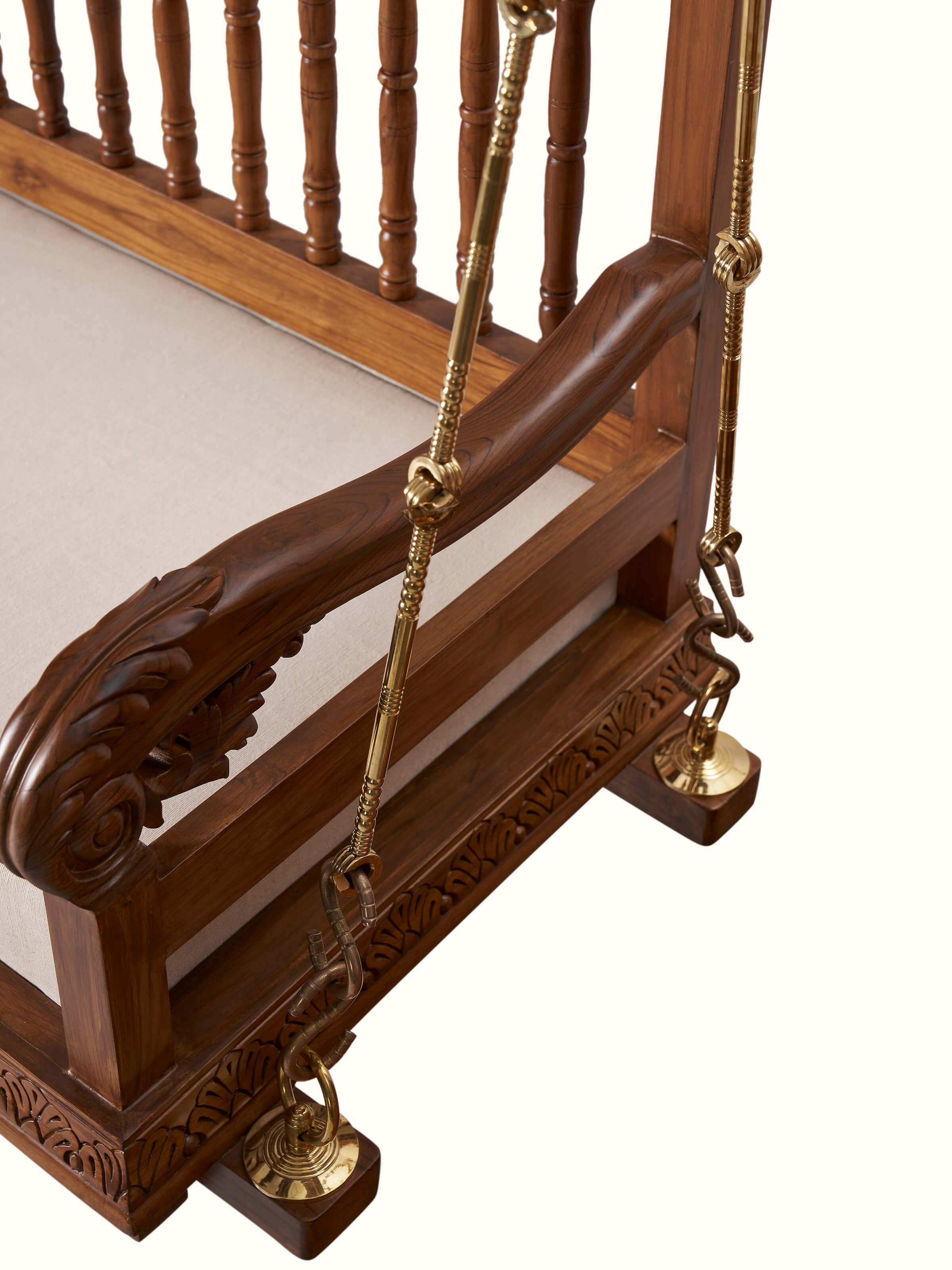 Detailed view of the swing's frame and upholstery, highlighting the quality of Sheesham wood and craftsmanship