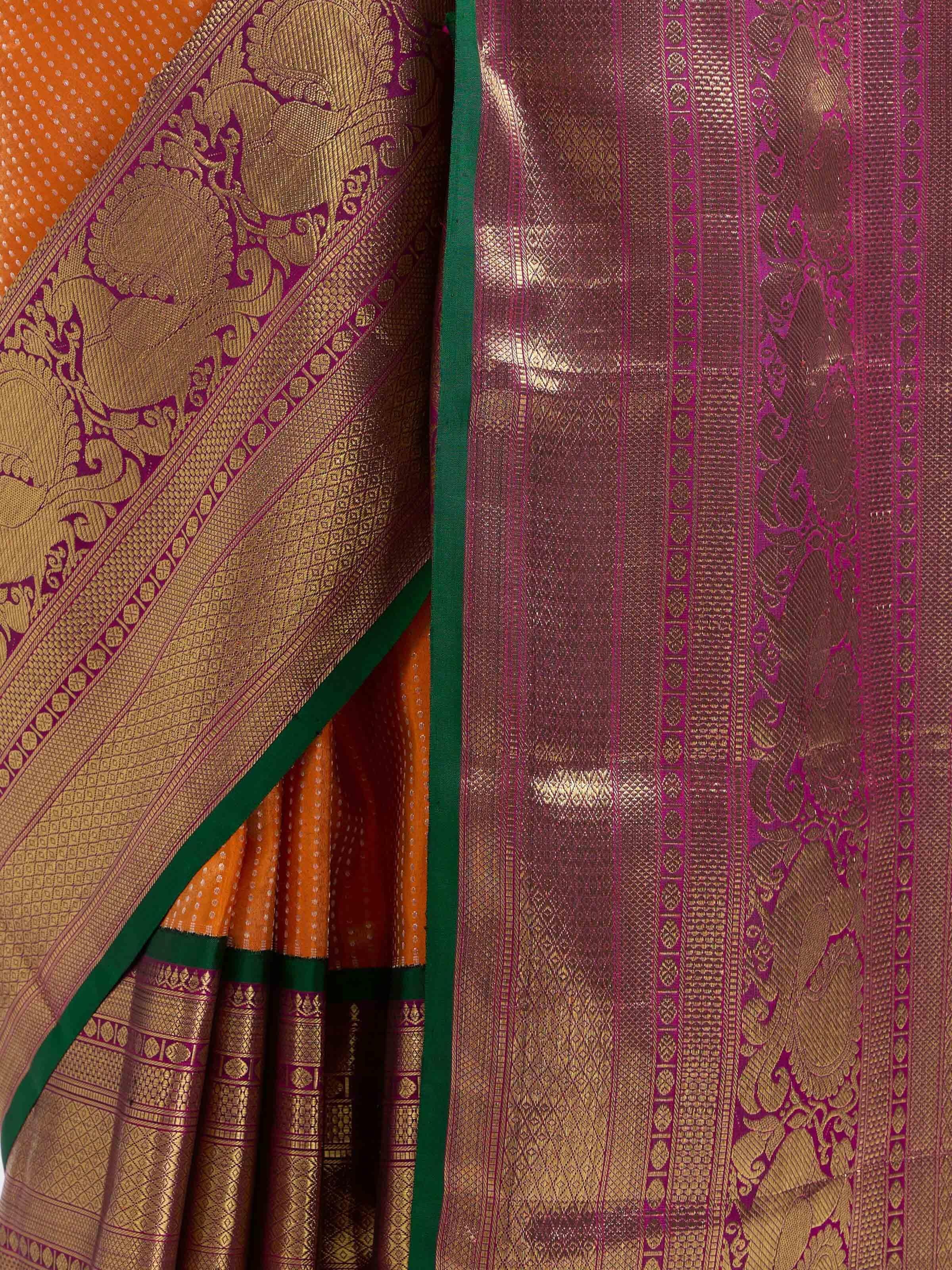 Detail view of mango silk Kancheepuram saree showing silk texture and craftsmanship