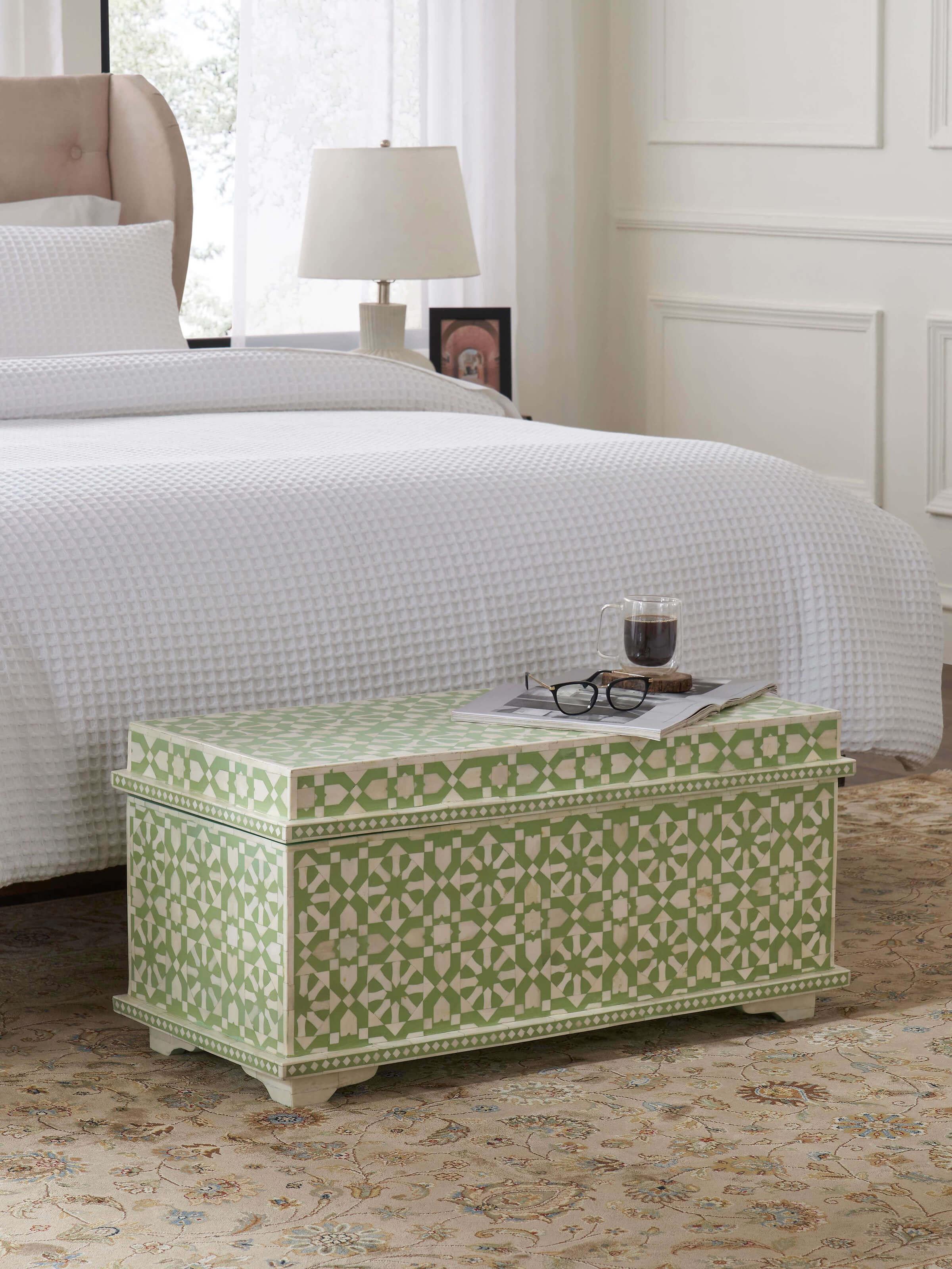 Side view of the bone inlaid trunk, highlighting the detailed craftsmanship and elegant design