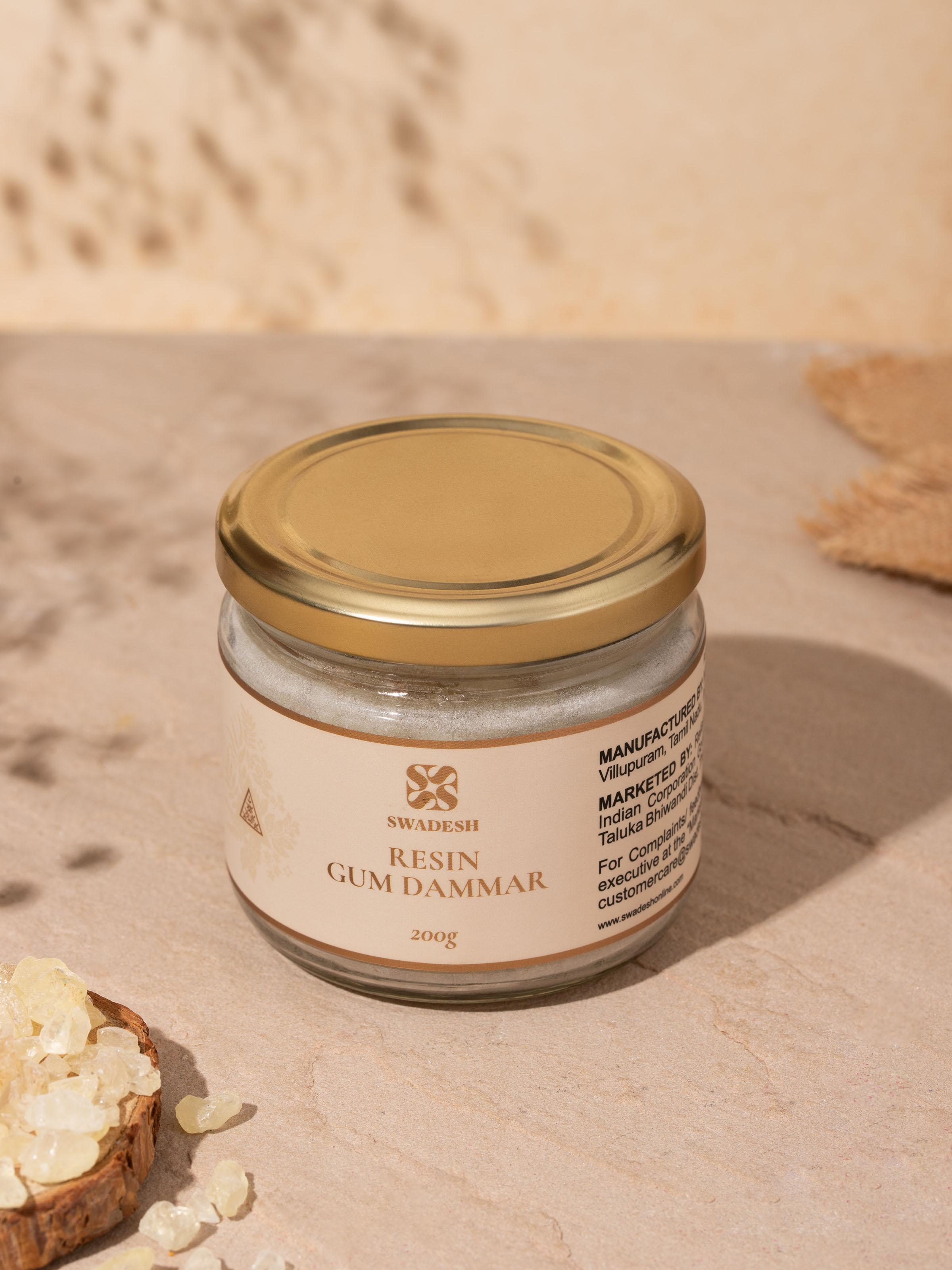 Lifestyle shot of Dammar Resin Incense placed near diya for traditional spiritual use