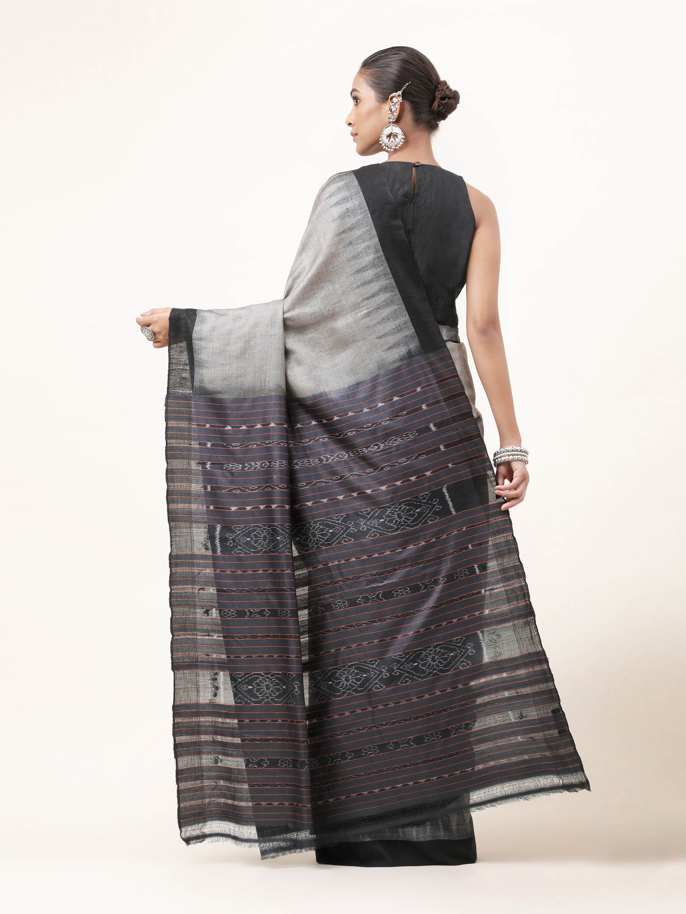 Back view of green Tussar silk Odisha Ikat saree with pleated pallu