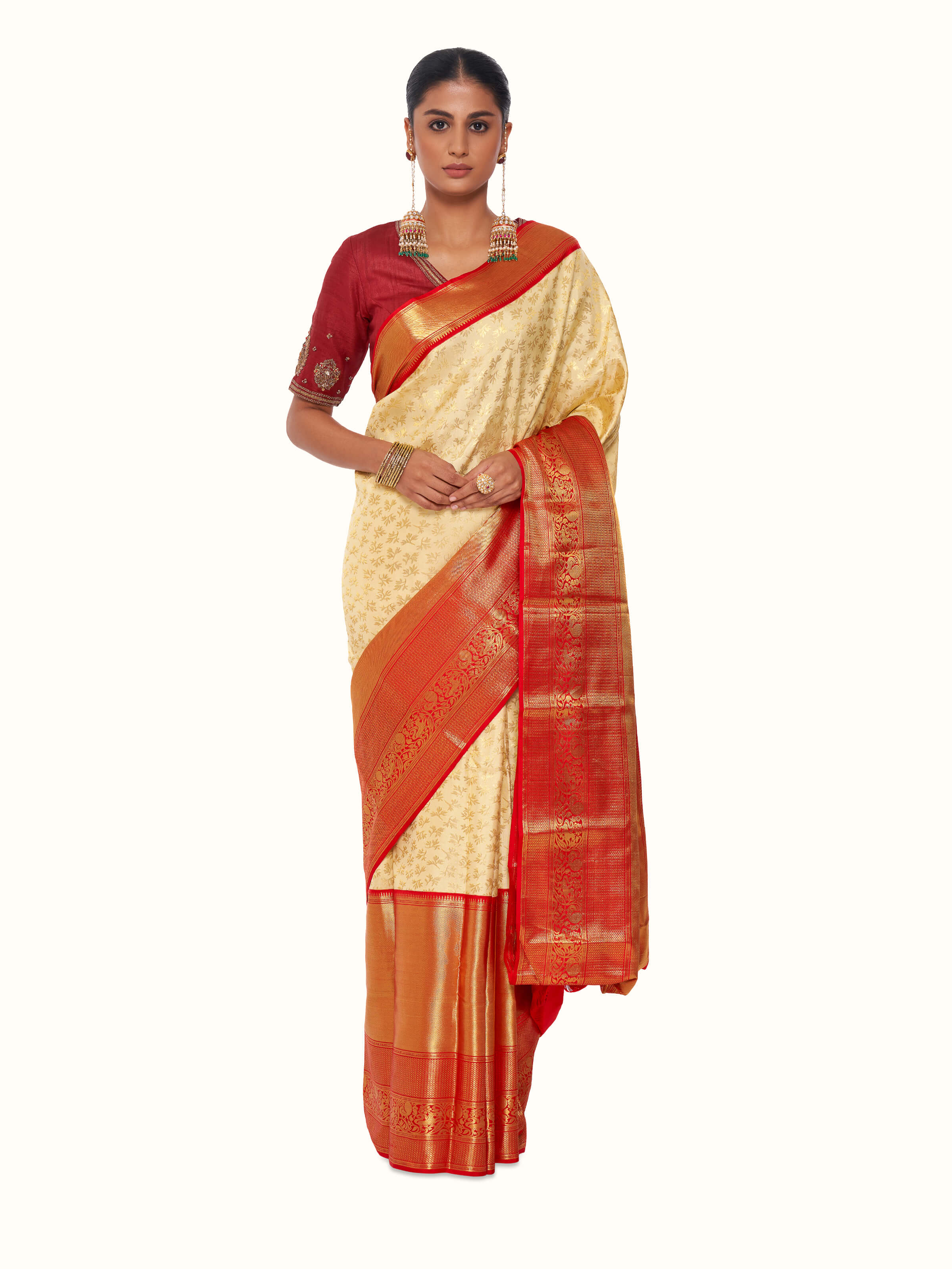Front view of off-white silk Dharmavaram saree with traditional woven border
