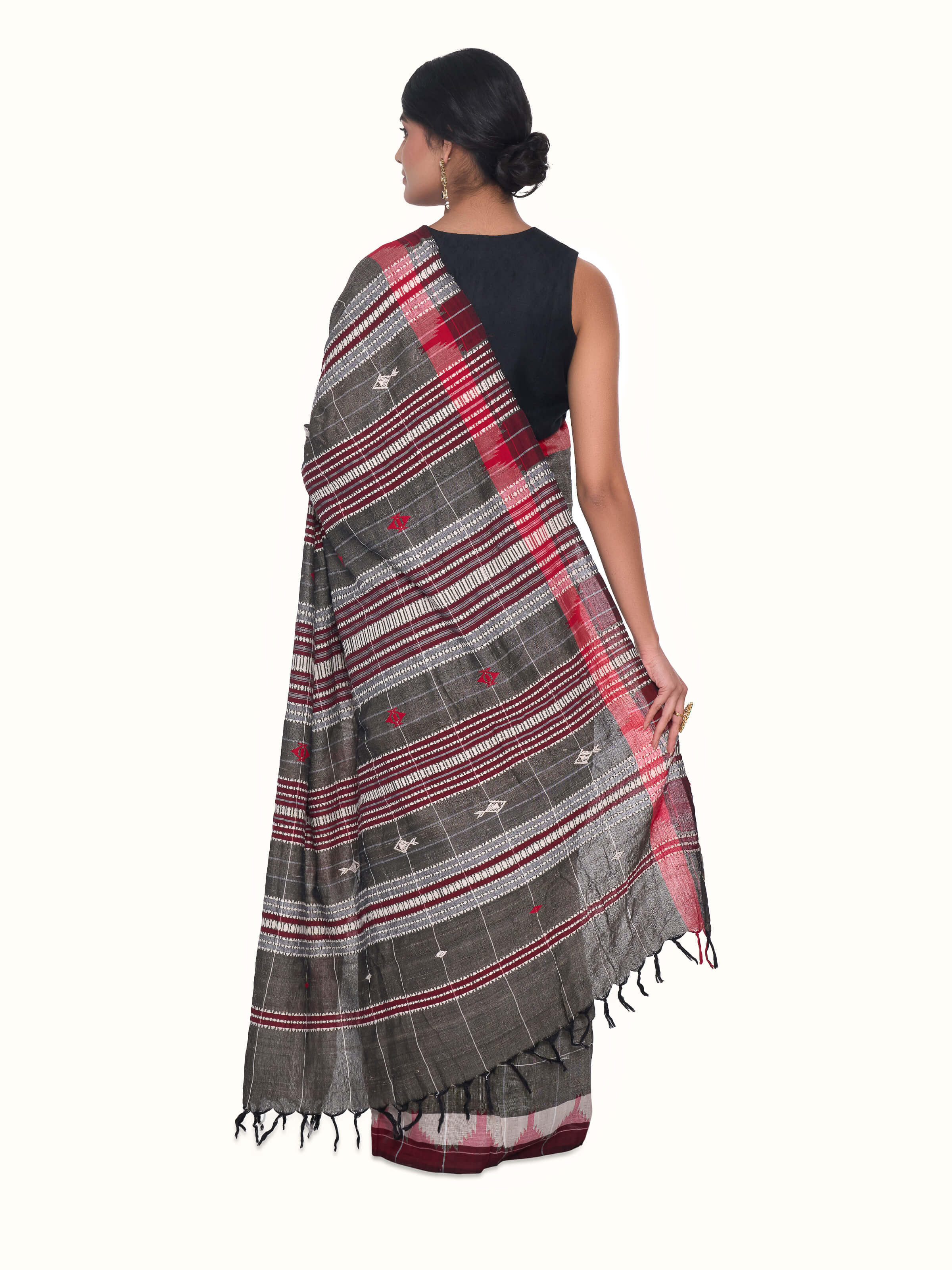 Back view of brown cotton tussar silk Kotpad saree displaying full pallu