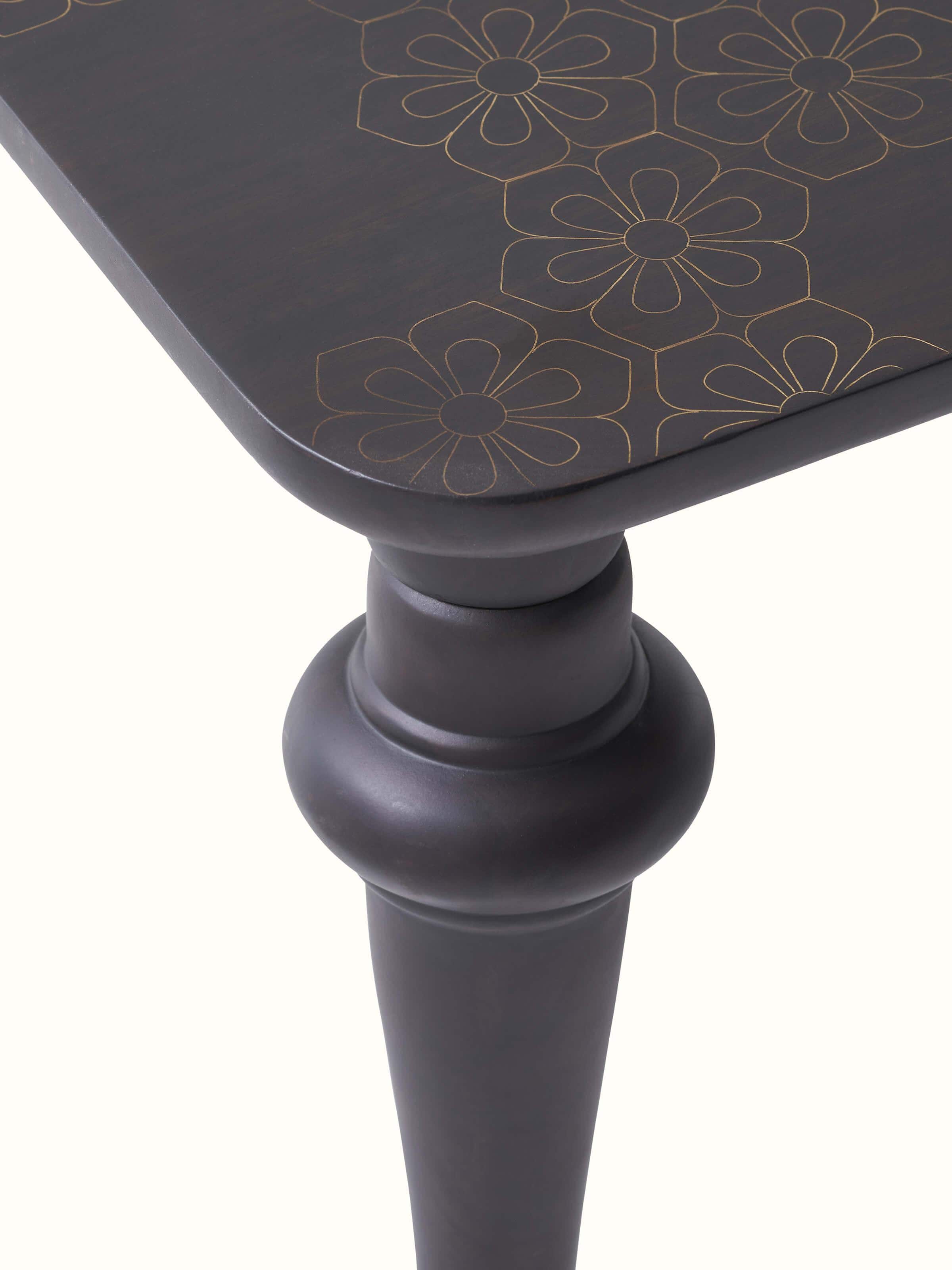 Top view of the Sheesham wood coffee table, highlighting the intricate brass tarkashi inlay and surface finish
