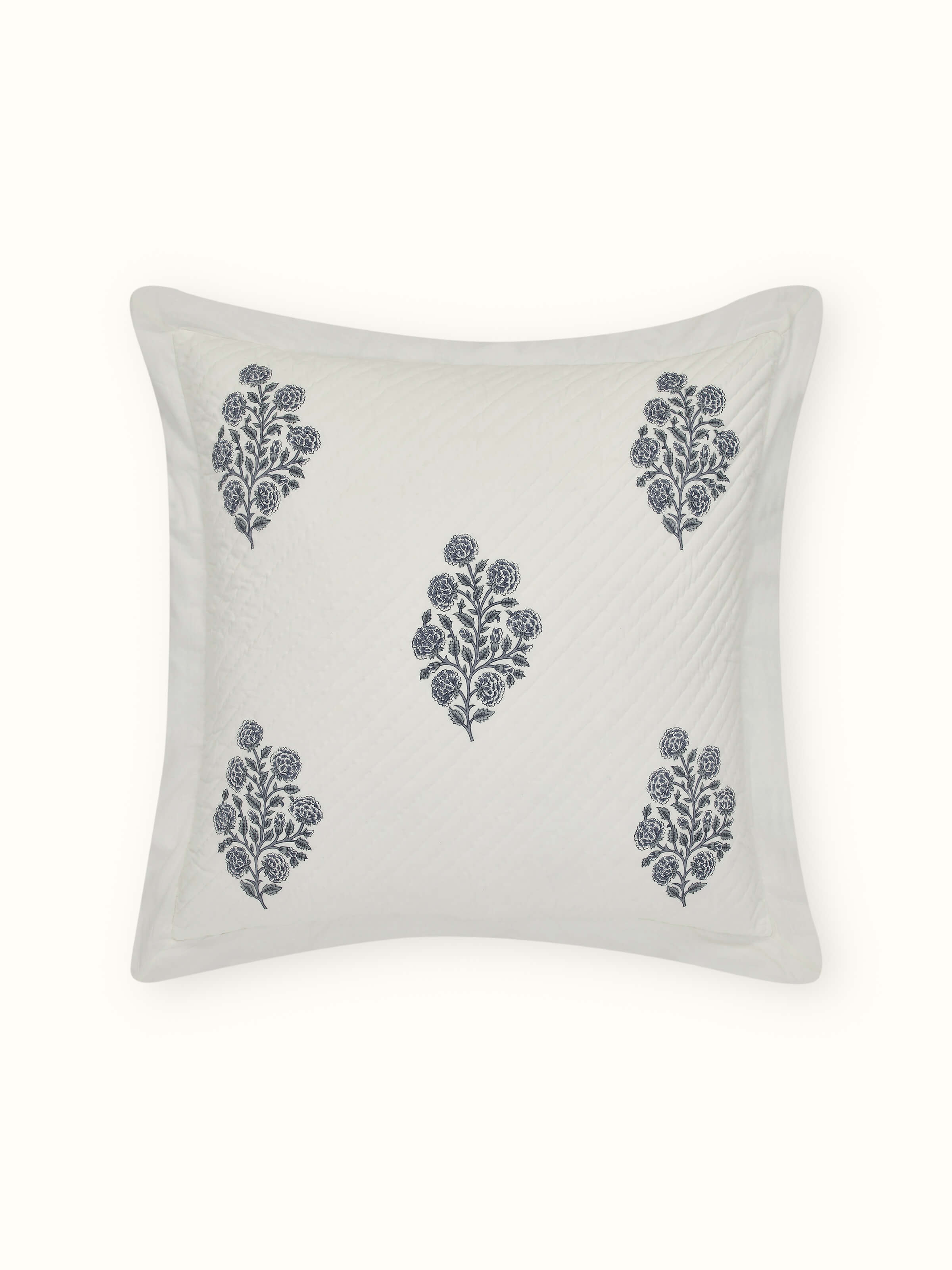 Close-up of the intricate hand block print details on the cotton fabric of the cushion covers