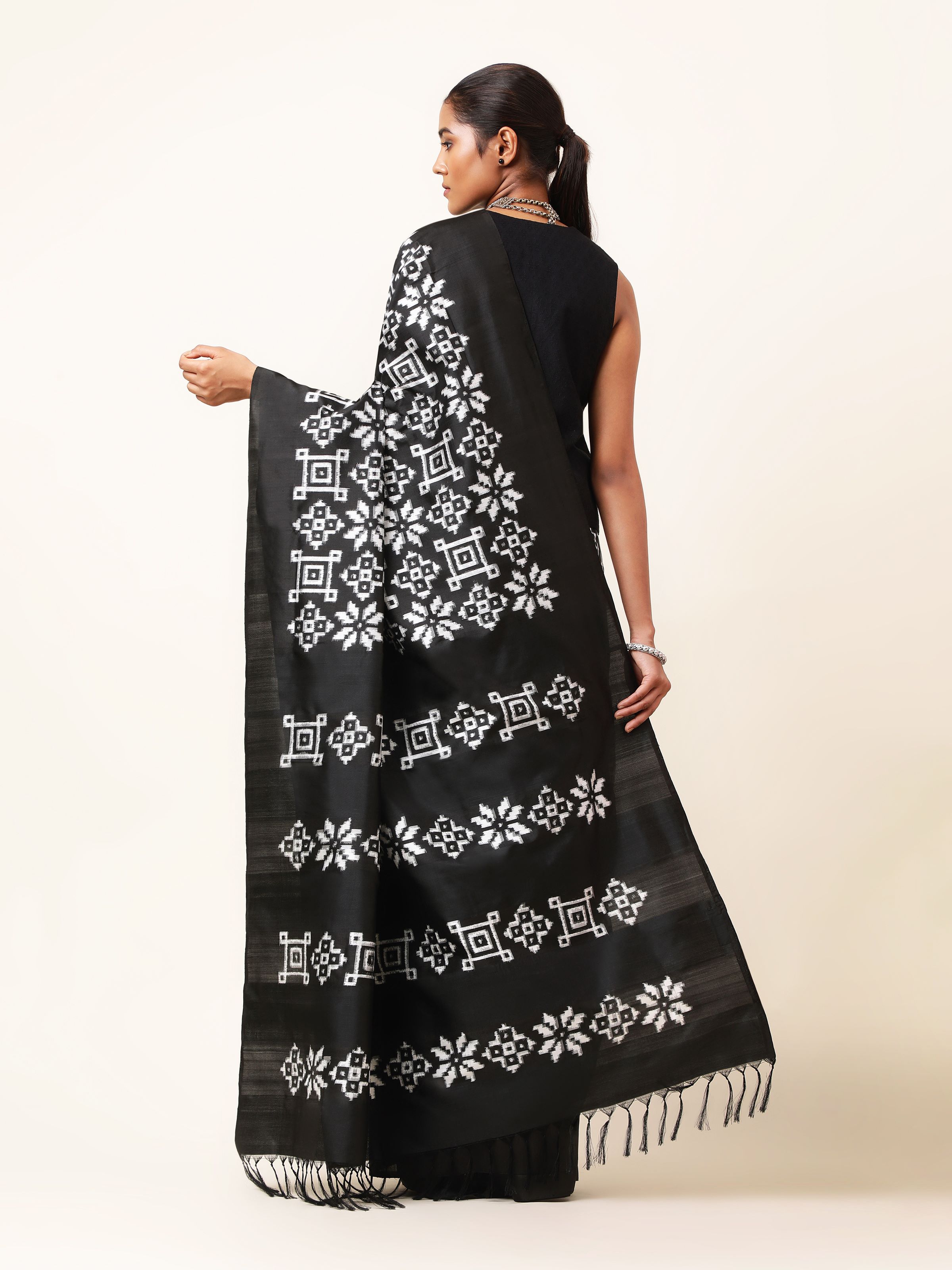 Back view capturing the subtle sheen and refined artistry.