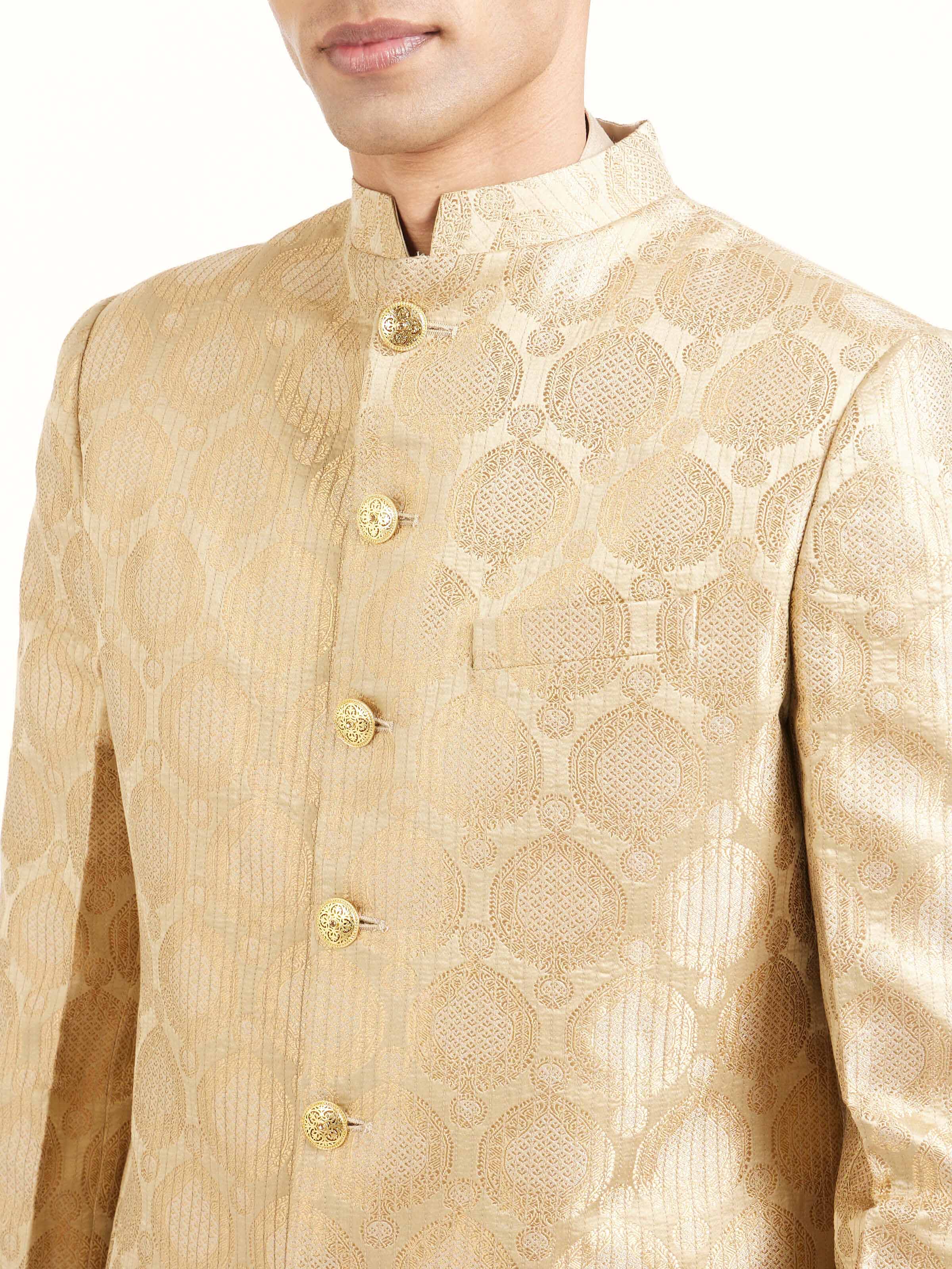 Detail view of beige silk traditional butidar Banarasi handloom brocade men’s sherwani showing fabric texture