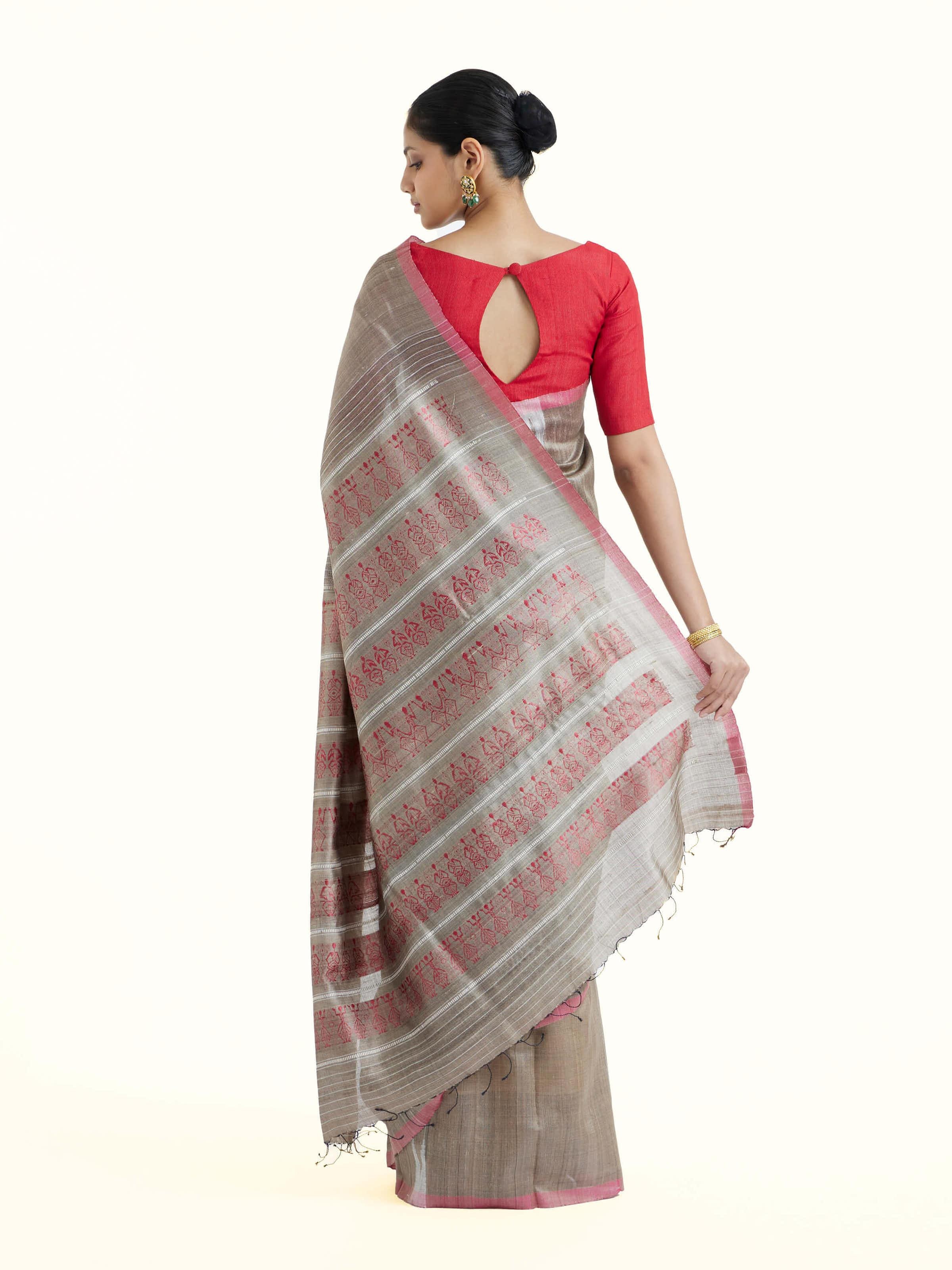 Back view of beige tussar silk Odisha ikat saree displaying pallu design