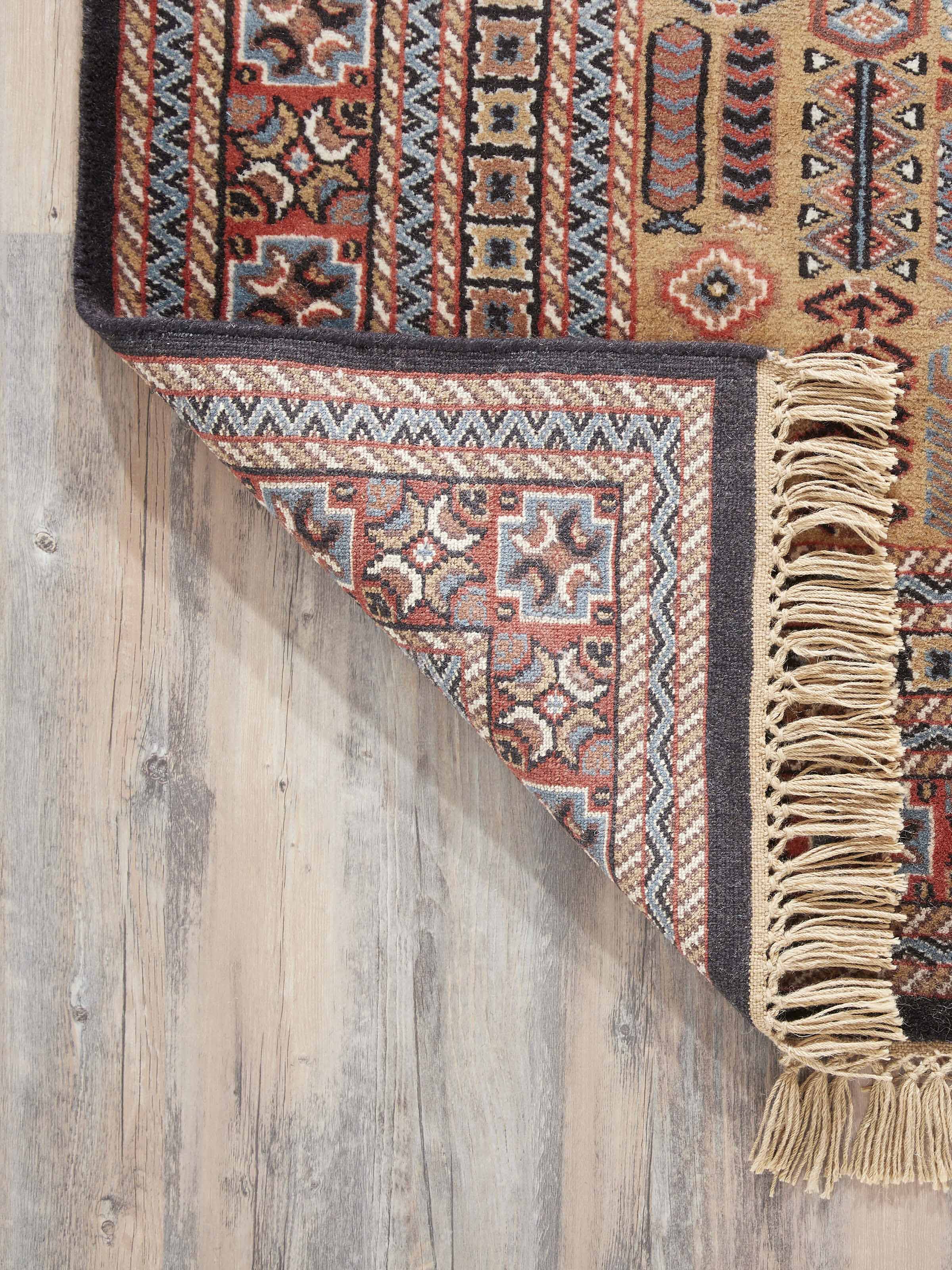 Detailed shot focusing on the precision of the knotting and fine wool texture