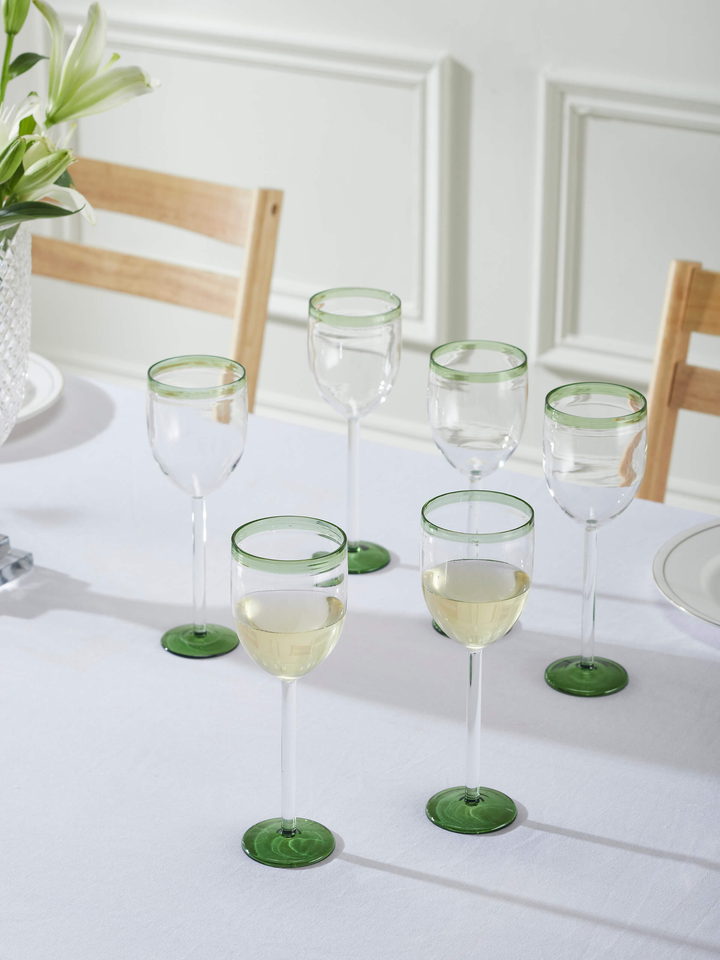 Front view of green wine glasses (6 pcs), highlighting their sophisticated shape and vibrant green hue.