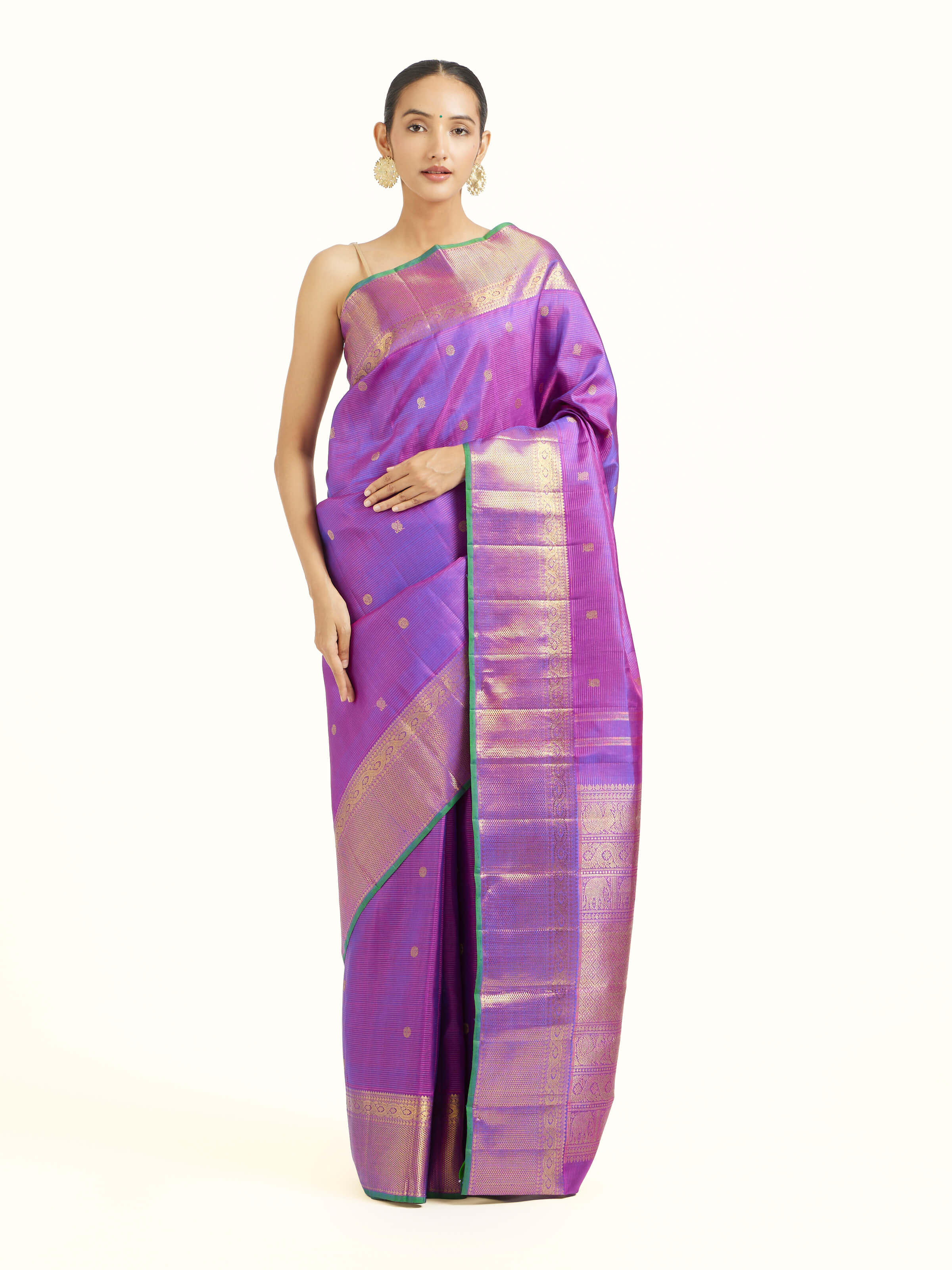 Front view of purple silk Kancheepuram saree with rich zari border