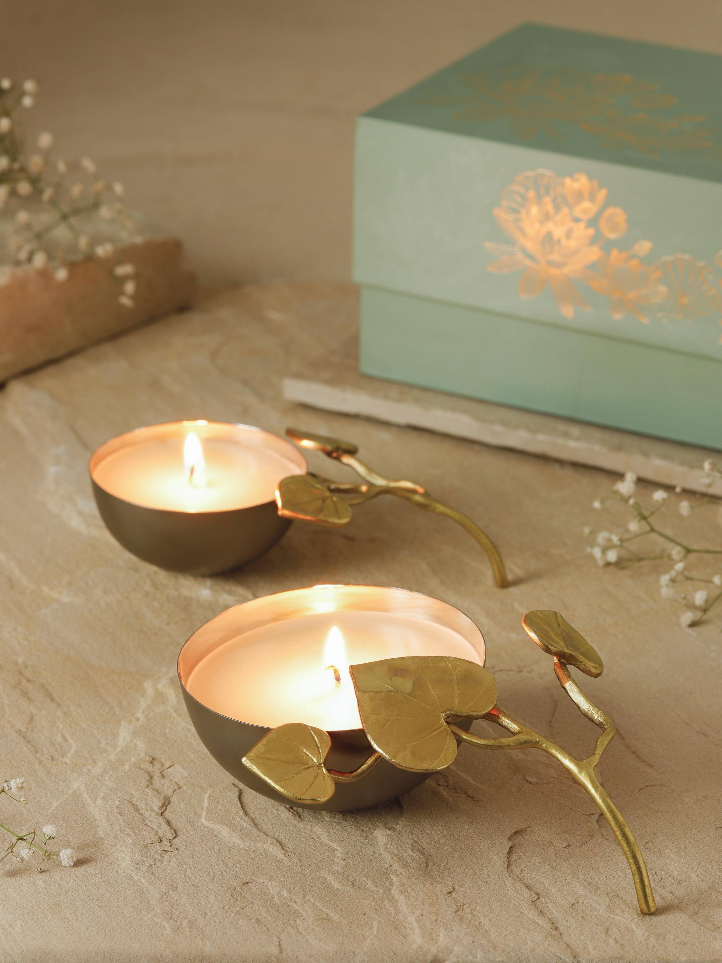Close-up view of Neroli brass candles (set of 2) highlighting the intricate patterns and high-quality finish.