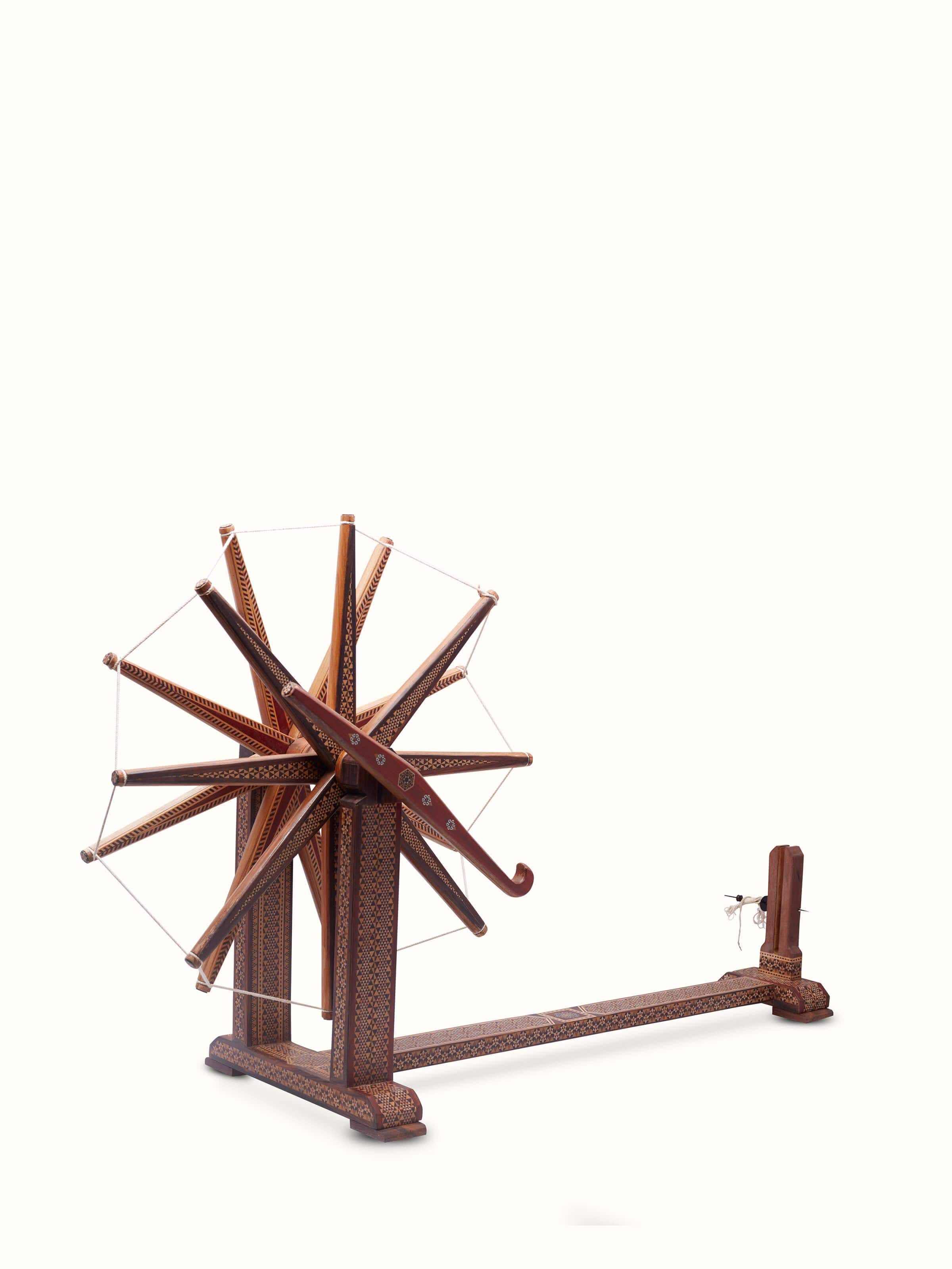 Side view of Marquetry Rosewood Charkha in Multicolor
