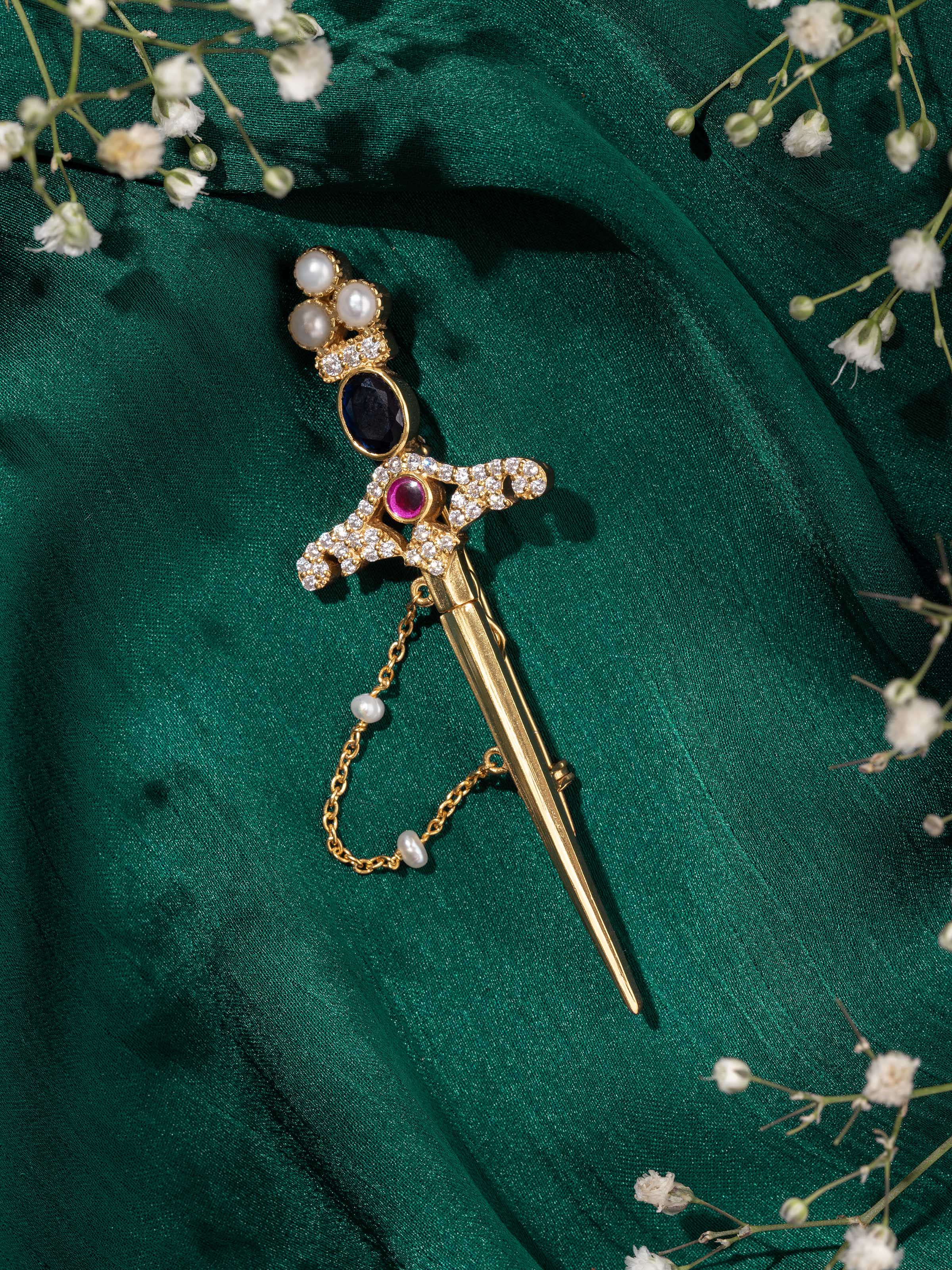 Lifestyle view of silver lapel pin styled on formal jacket to highlight classic appeal