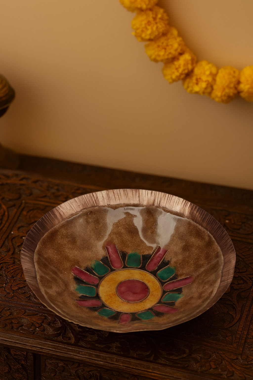 Lifestyle view of copper serving bowl handcrafted metal tableware