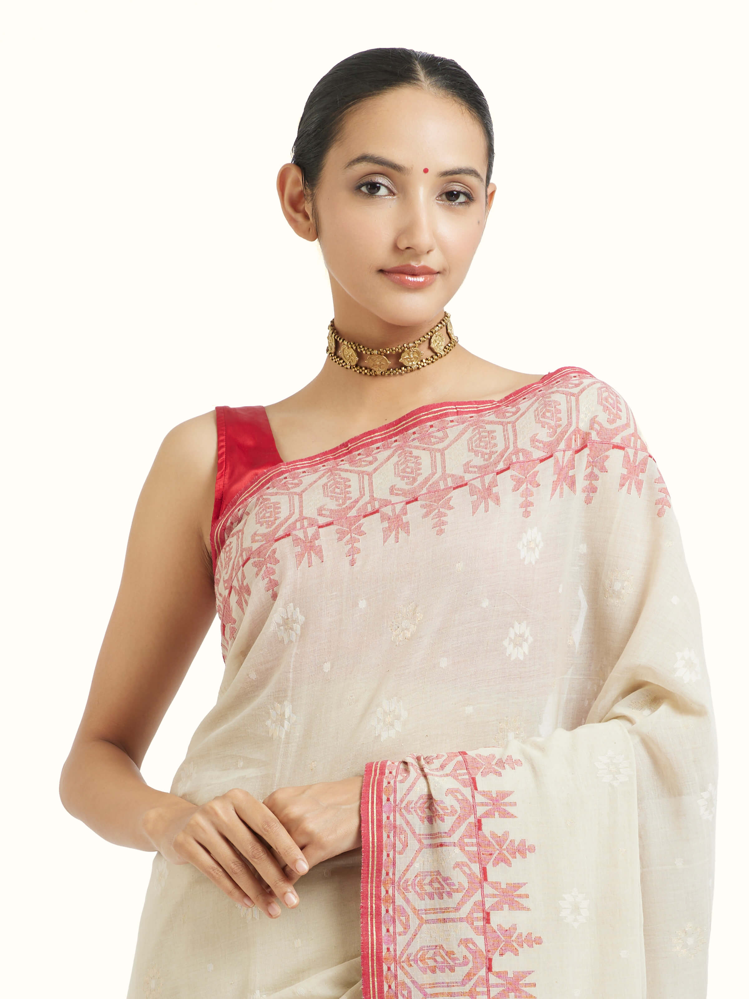 Angled view of off-white cotton Bengal Jamdani saree highlighting intricate jamdani weave