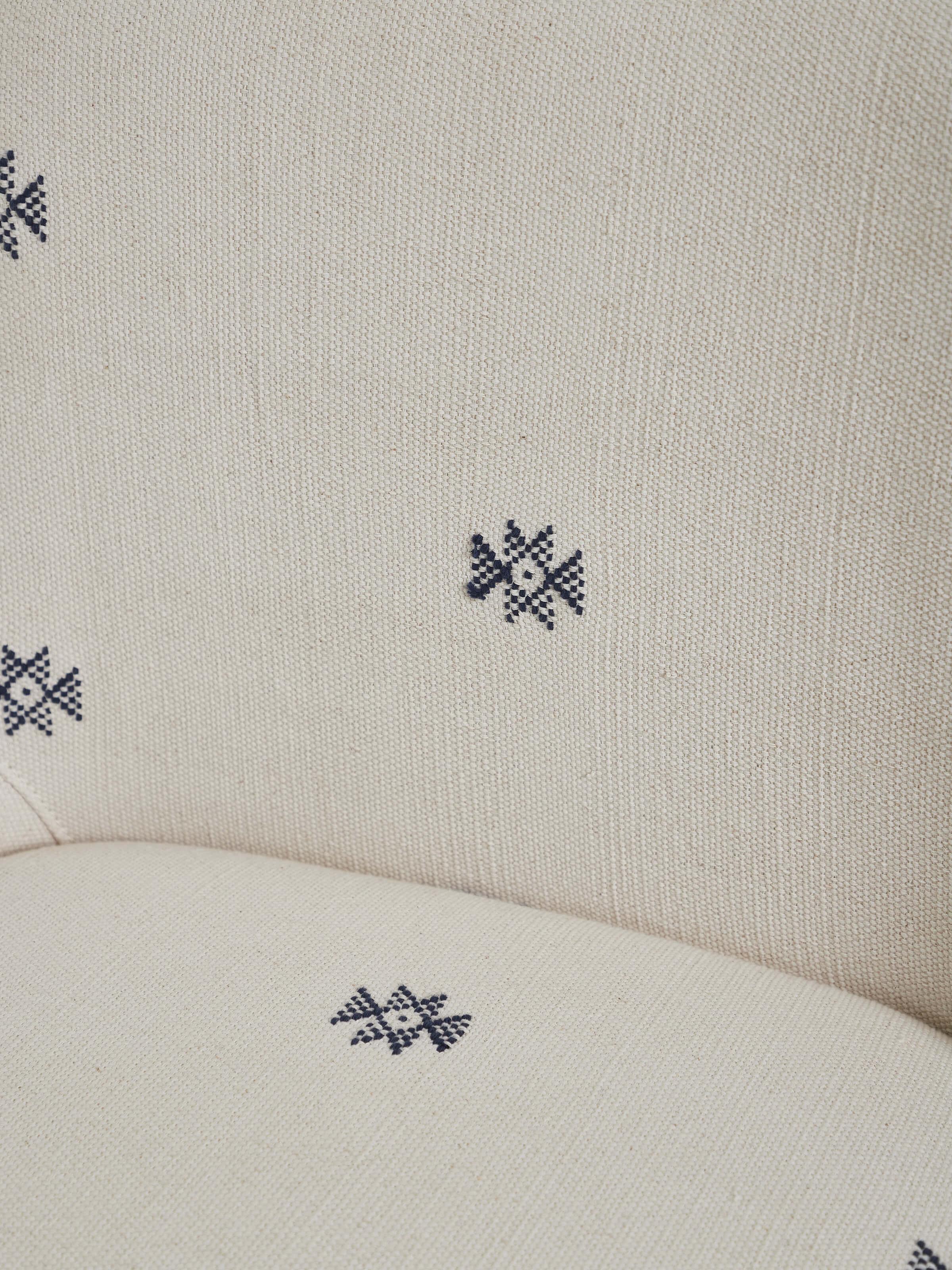 Detailed view of Upholstered Metal Bar Chair emphasizing the fine stitching and luxurious upholstery finish.