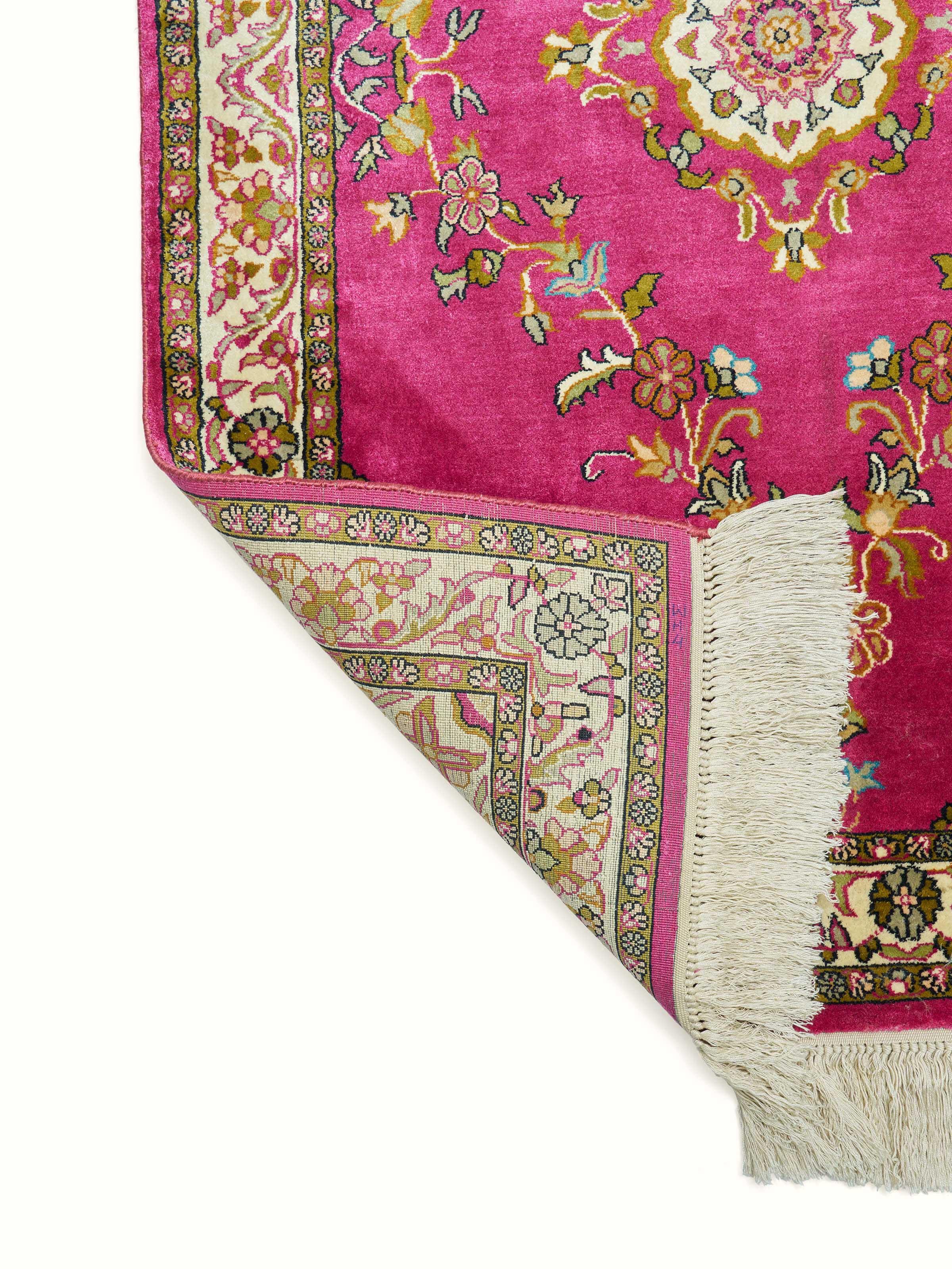 Back view showing neat finish and silk knotting of the Opan pink carpet