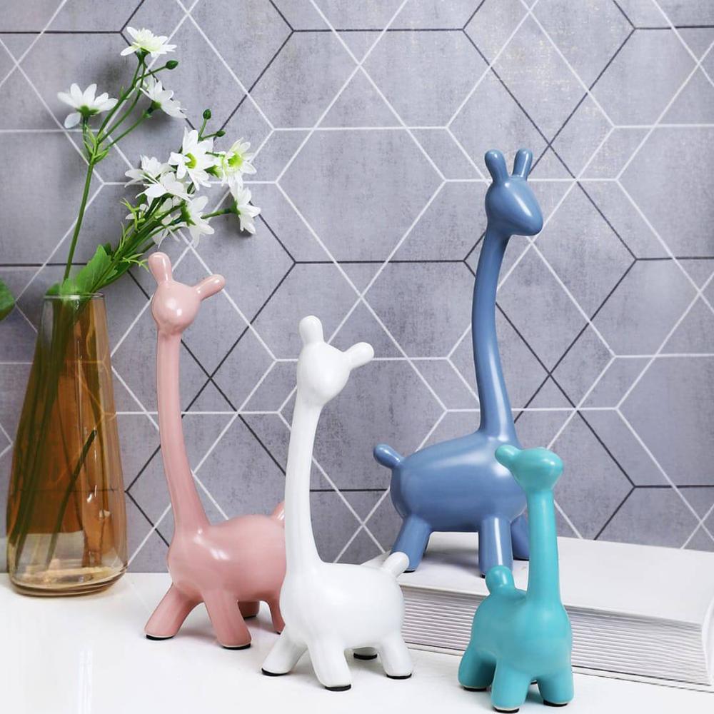 Set Of 4 Graceful Giraffe Showpieces