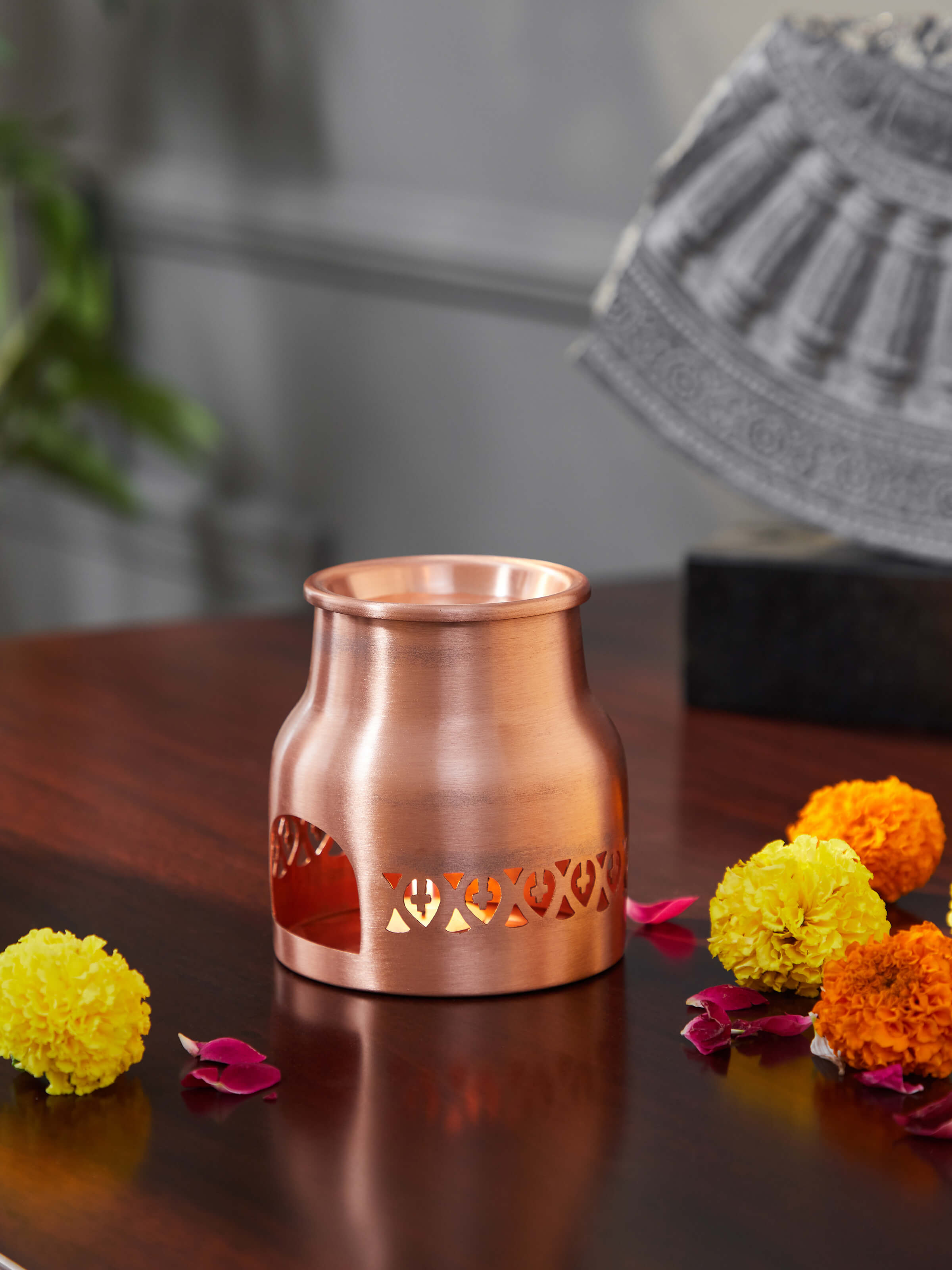 Side view of Swadesh Traditional Copper Diffuser showing the refined craftsmanship and stylish silhouette.