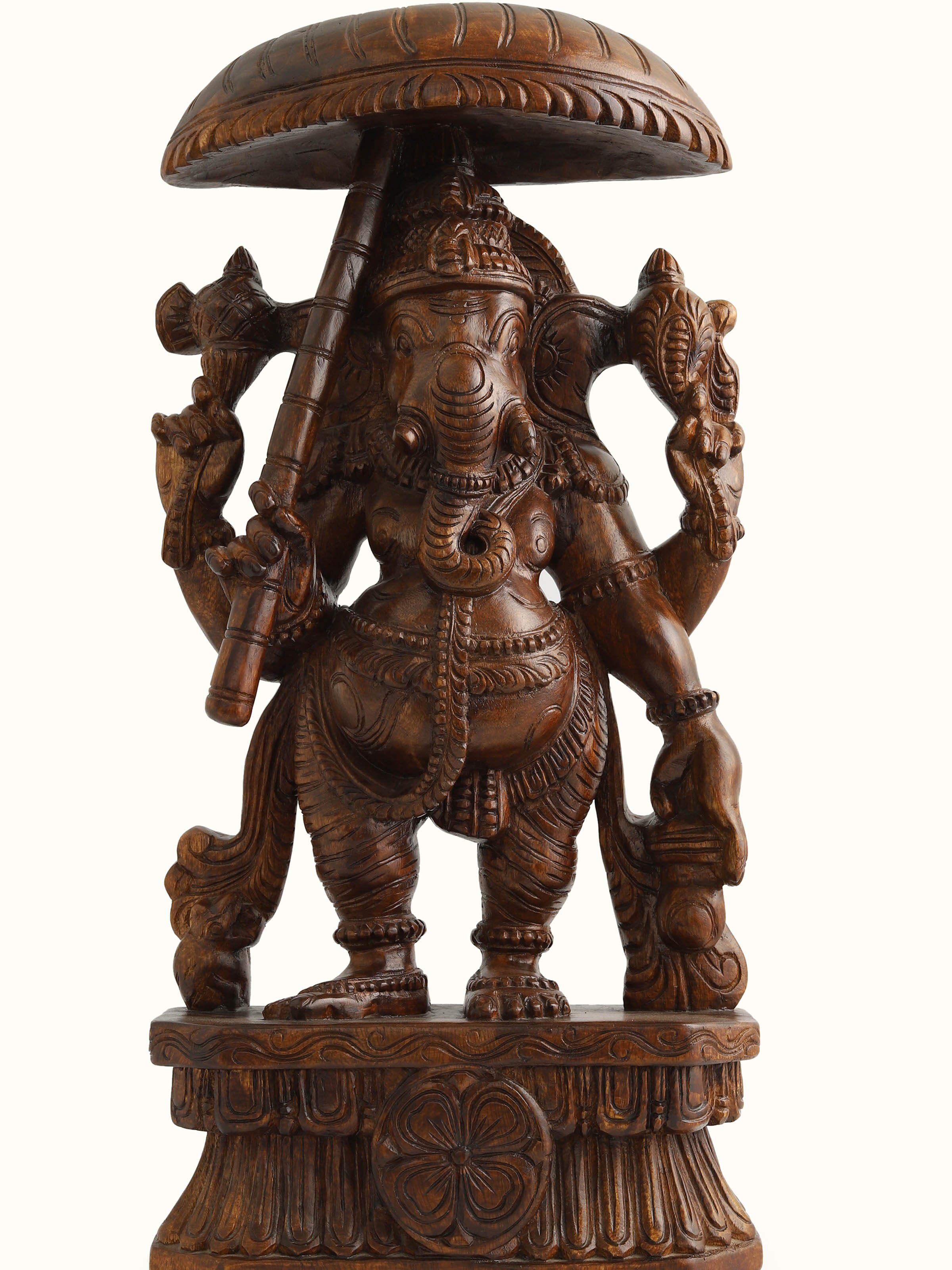 Detailed view of Siddhipriya Ganesha Idol, focusing on the intricate carving and polished finish of the Vaagai wood.