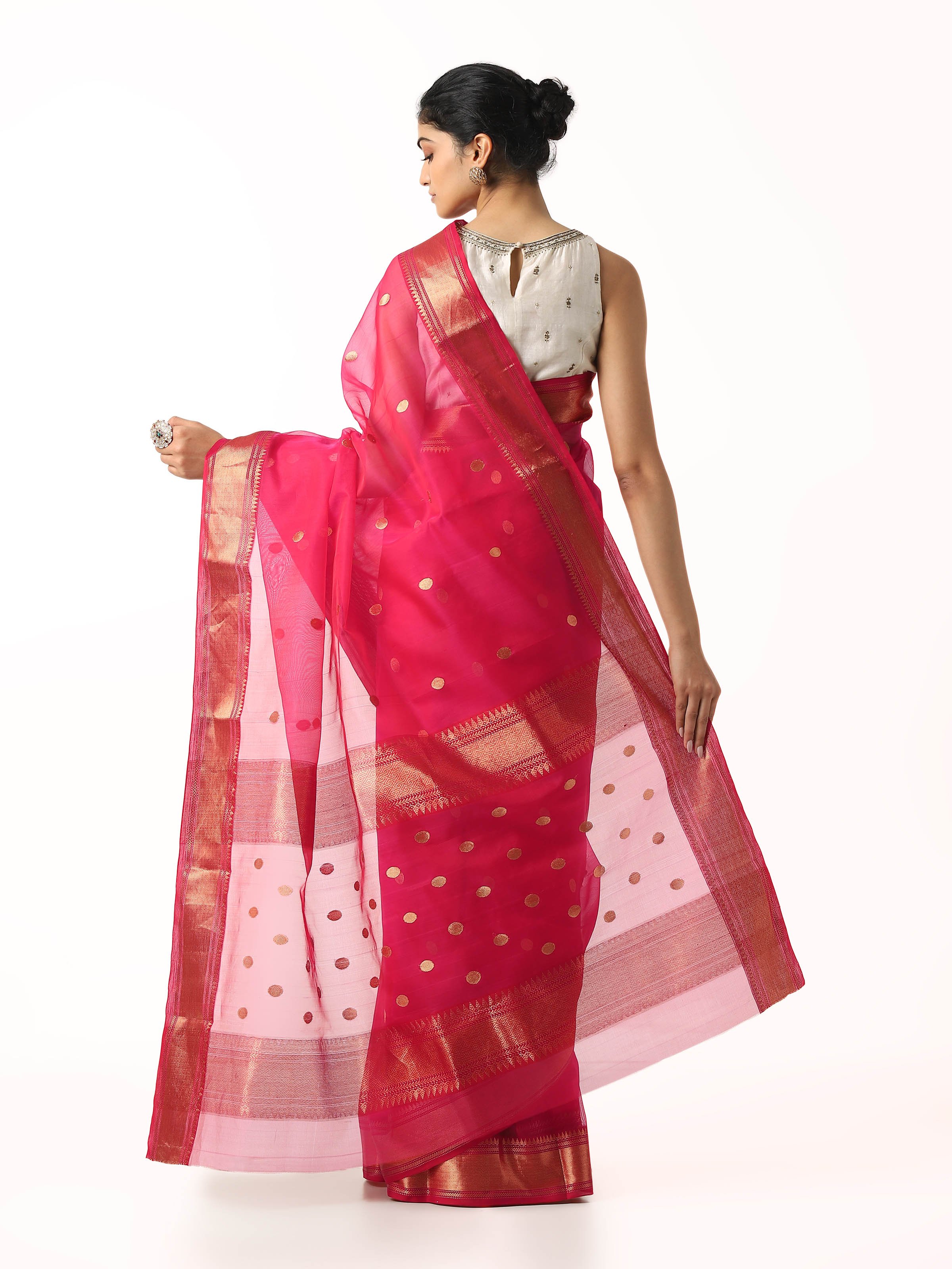 Back view of red cotton silk Chanderi saree displaying pallu and overall fall