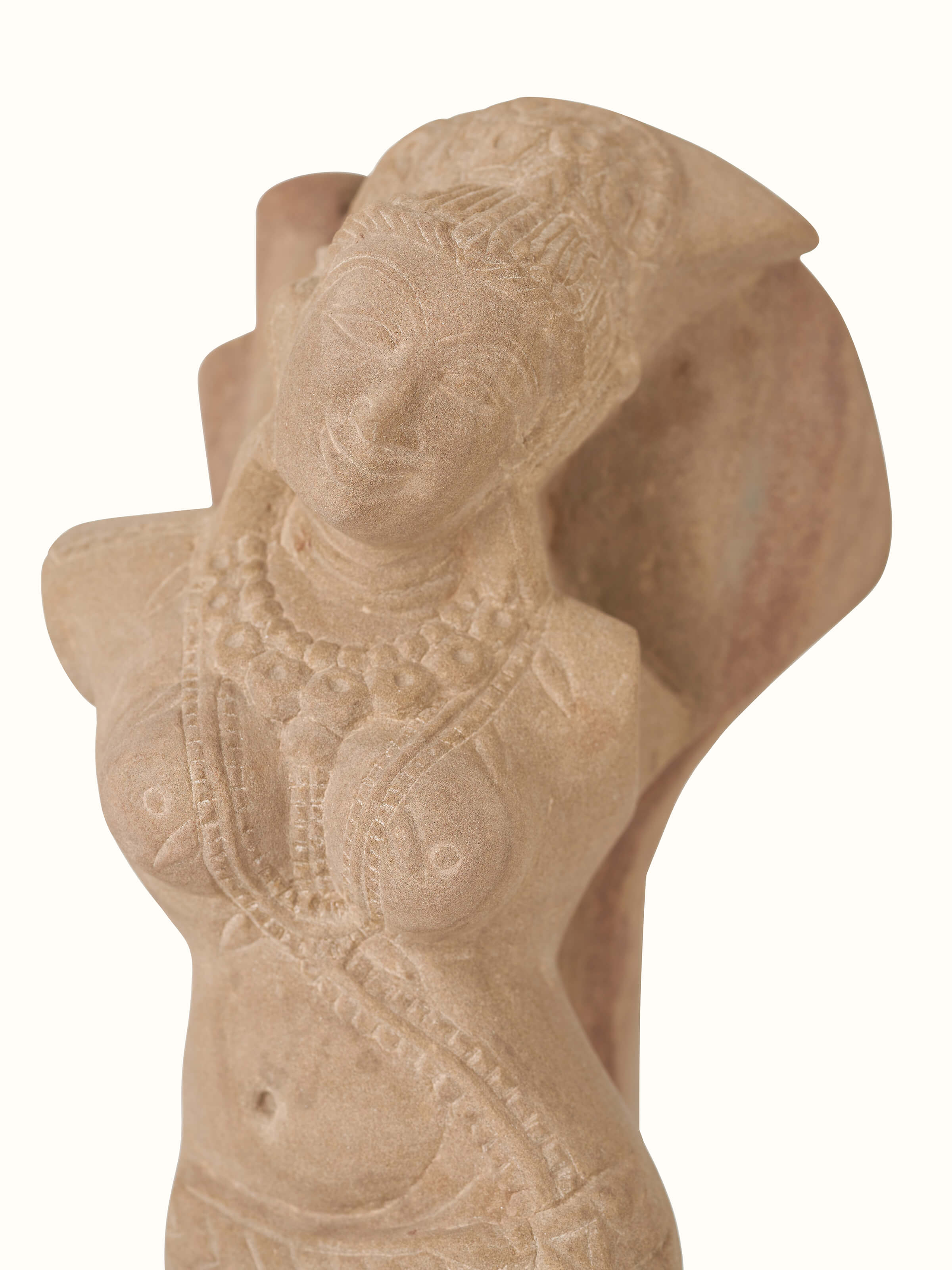 Detail view of Enchanting Carved Stone Shalabhanjika Sculpture focusing on the fine carving and stone texture.
