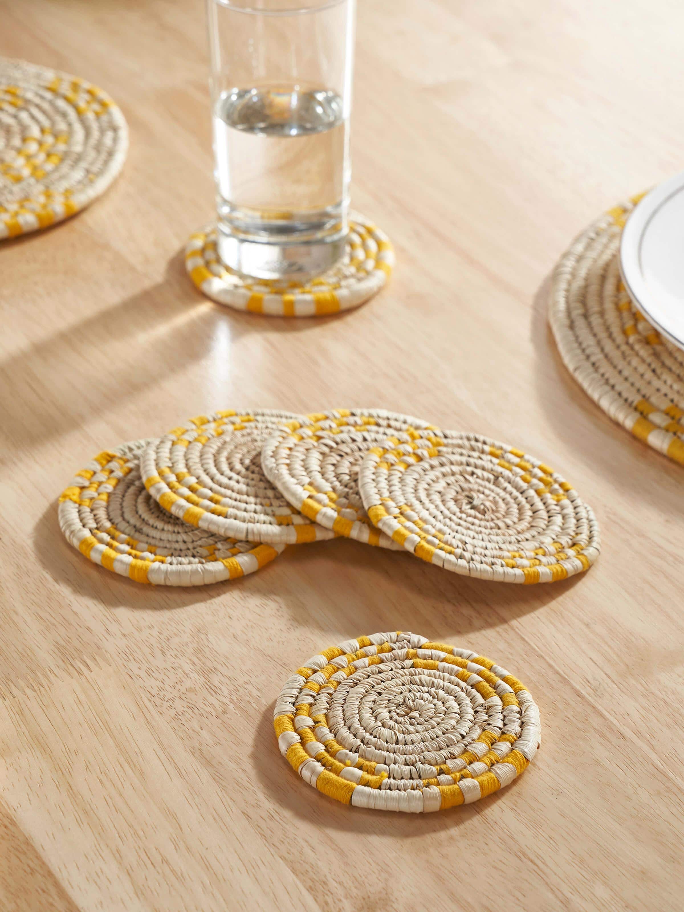 Top view displaying the round shape and smooth finish of the coasters in a set of six
