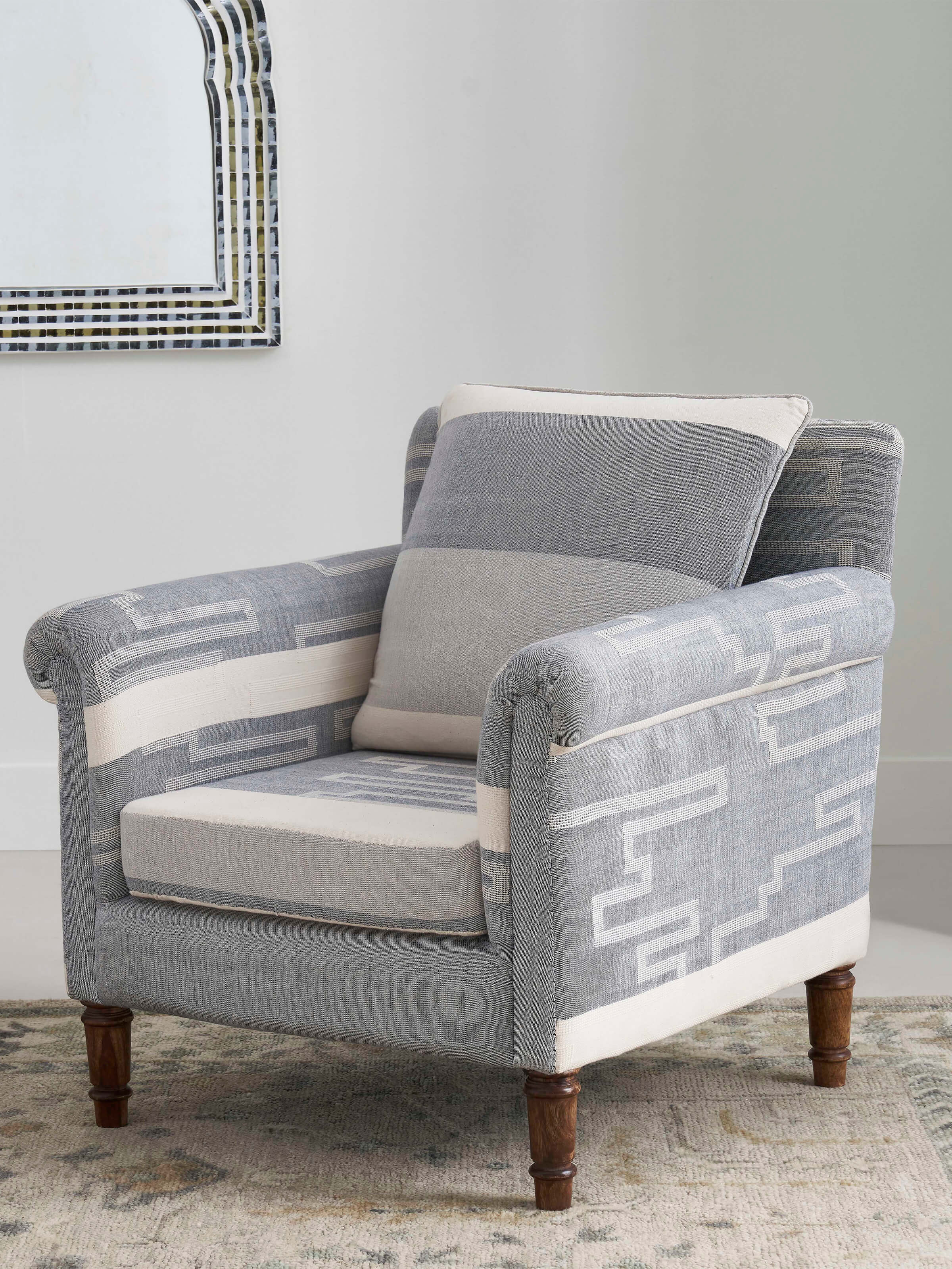 Side view of Sheesham Wood Bawan Buti Lounge Chair, highlighting the detailed woodwork and traditional style