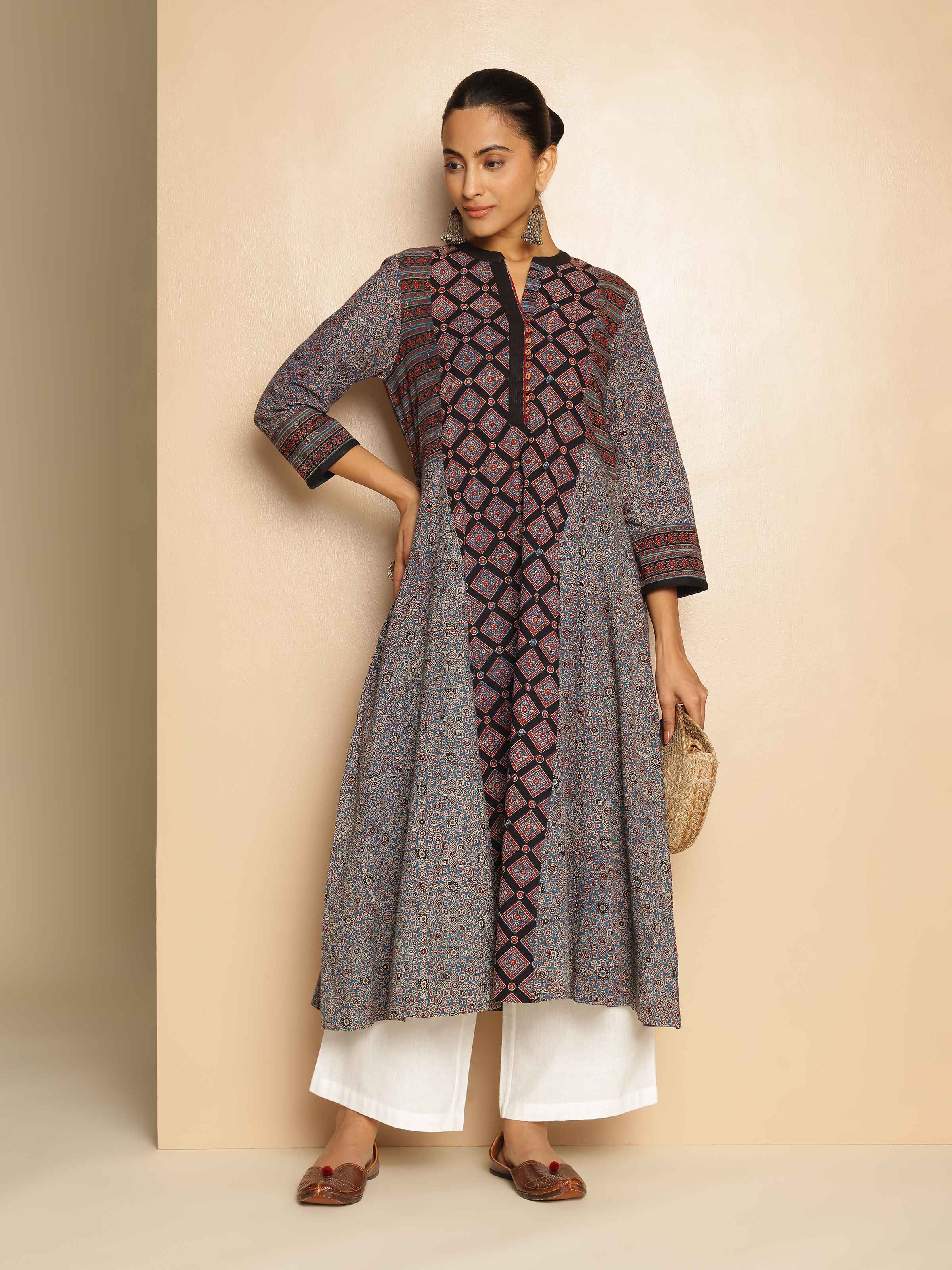 Lifestyle view of Black Cotton Ajrakh Block Printed Flared Kurta worn casually emphasizing block print patterns