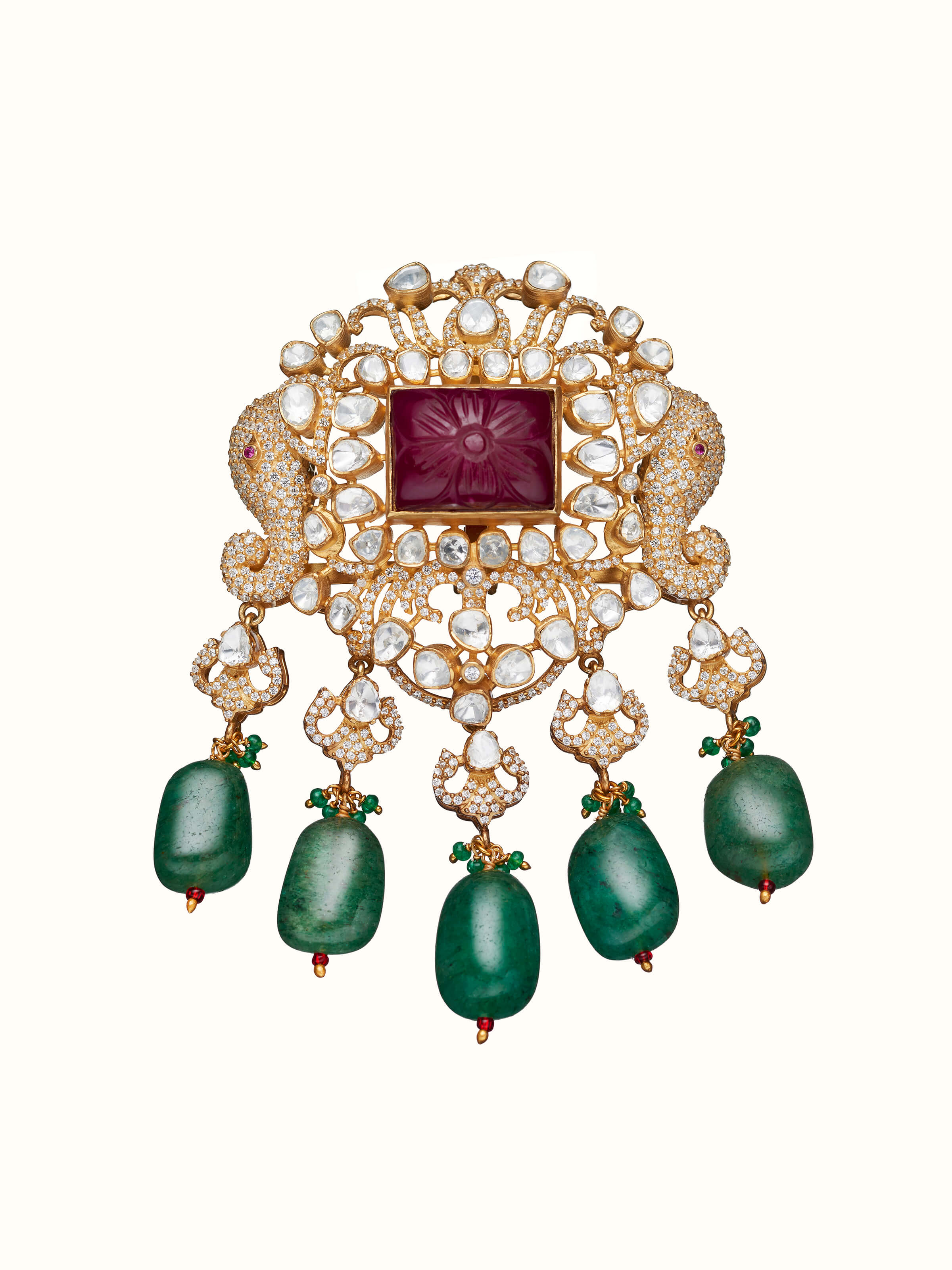 front view of silver smithing yellow gold brooch pin with intricate design