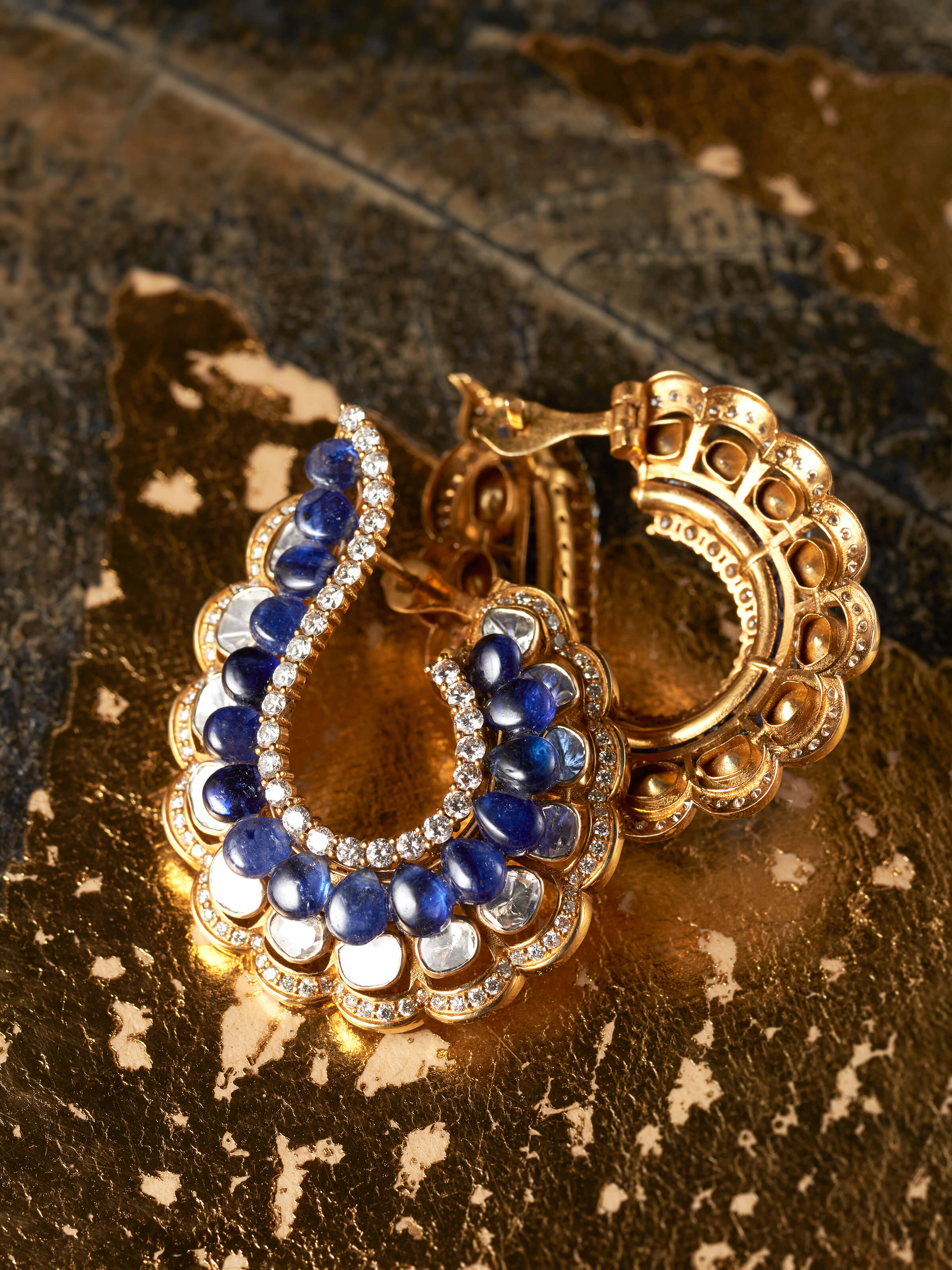 detail view of dank polki 14 karat gold hoop earrings design