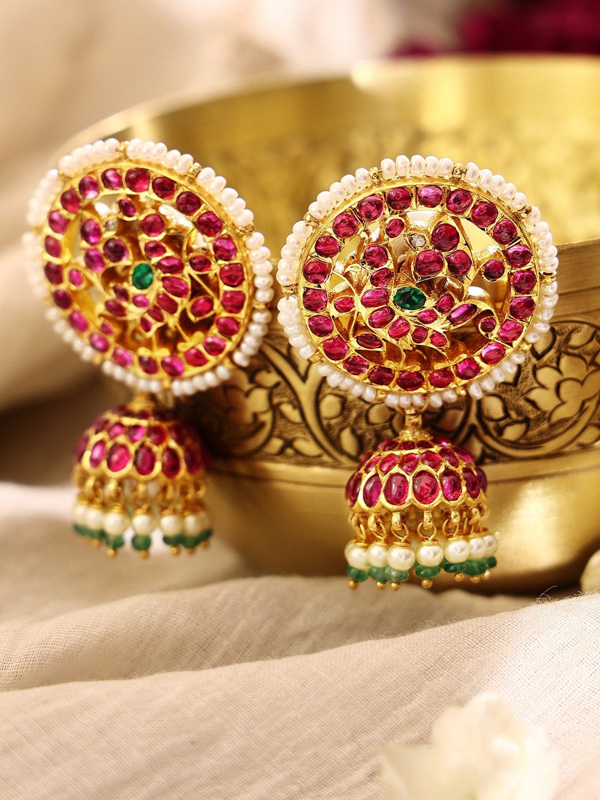 Close-up view of Kundala Velai 22 Karat Gold Jhumkas emphasizing detailed design and luxurious gold finish