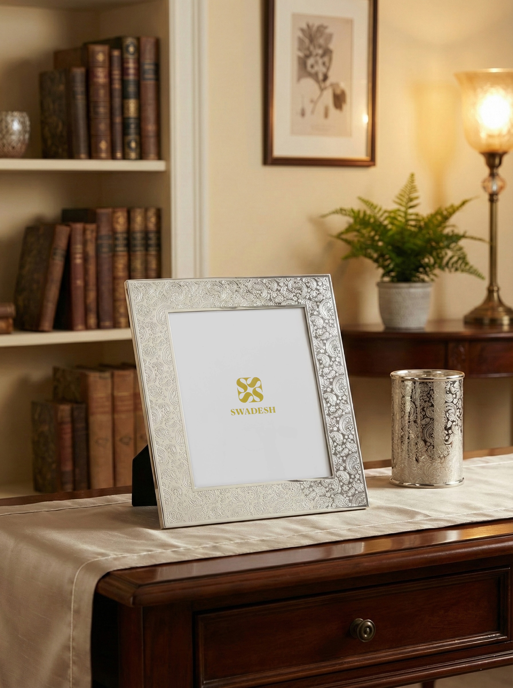 Silver-plated paisley rectangular photo frame with embossed floral pattern