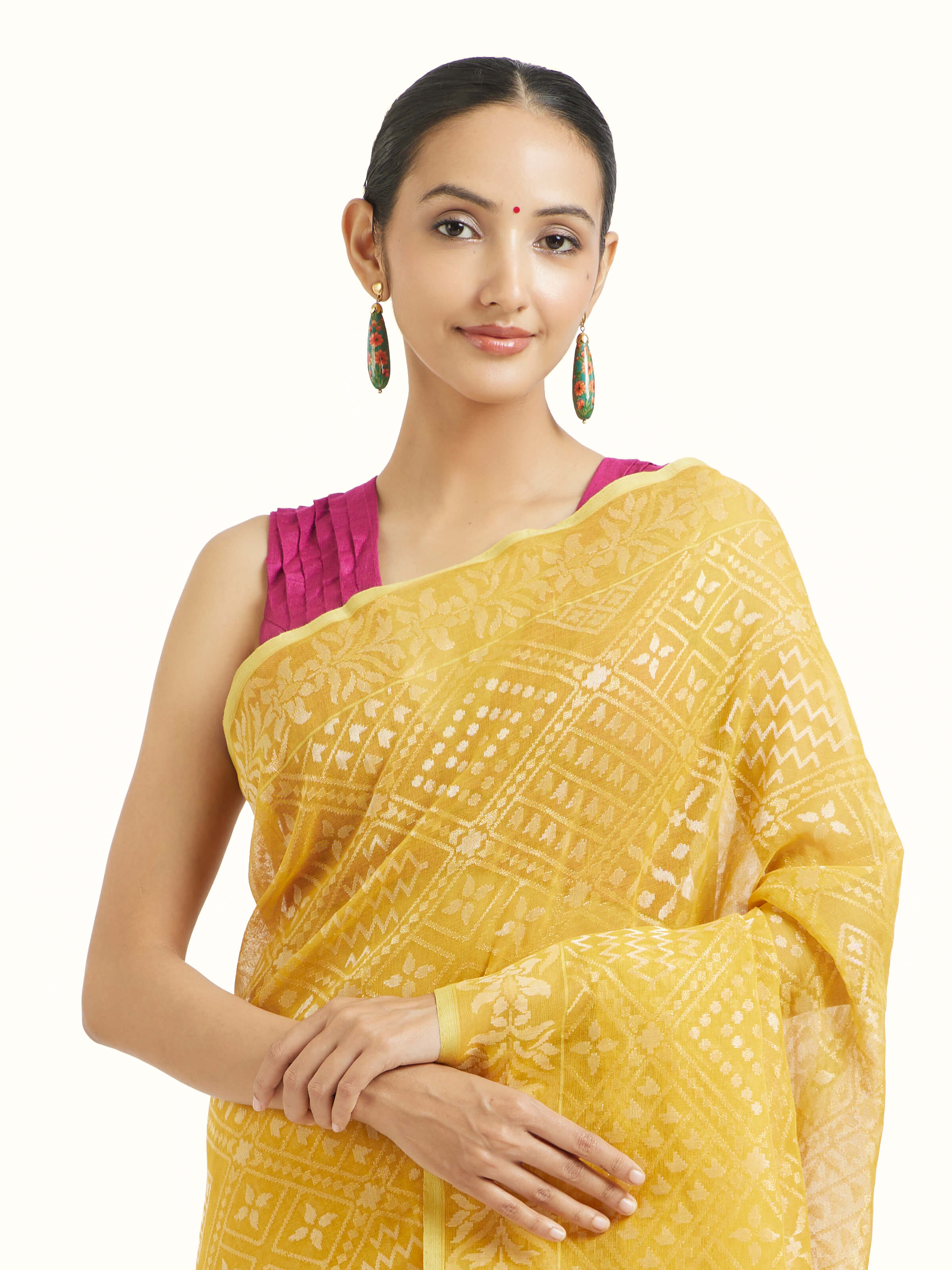 Angled view of yellow cotton Awadh Jamdani Banarasi saree highlighting jamdani weave