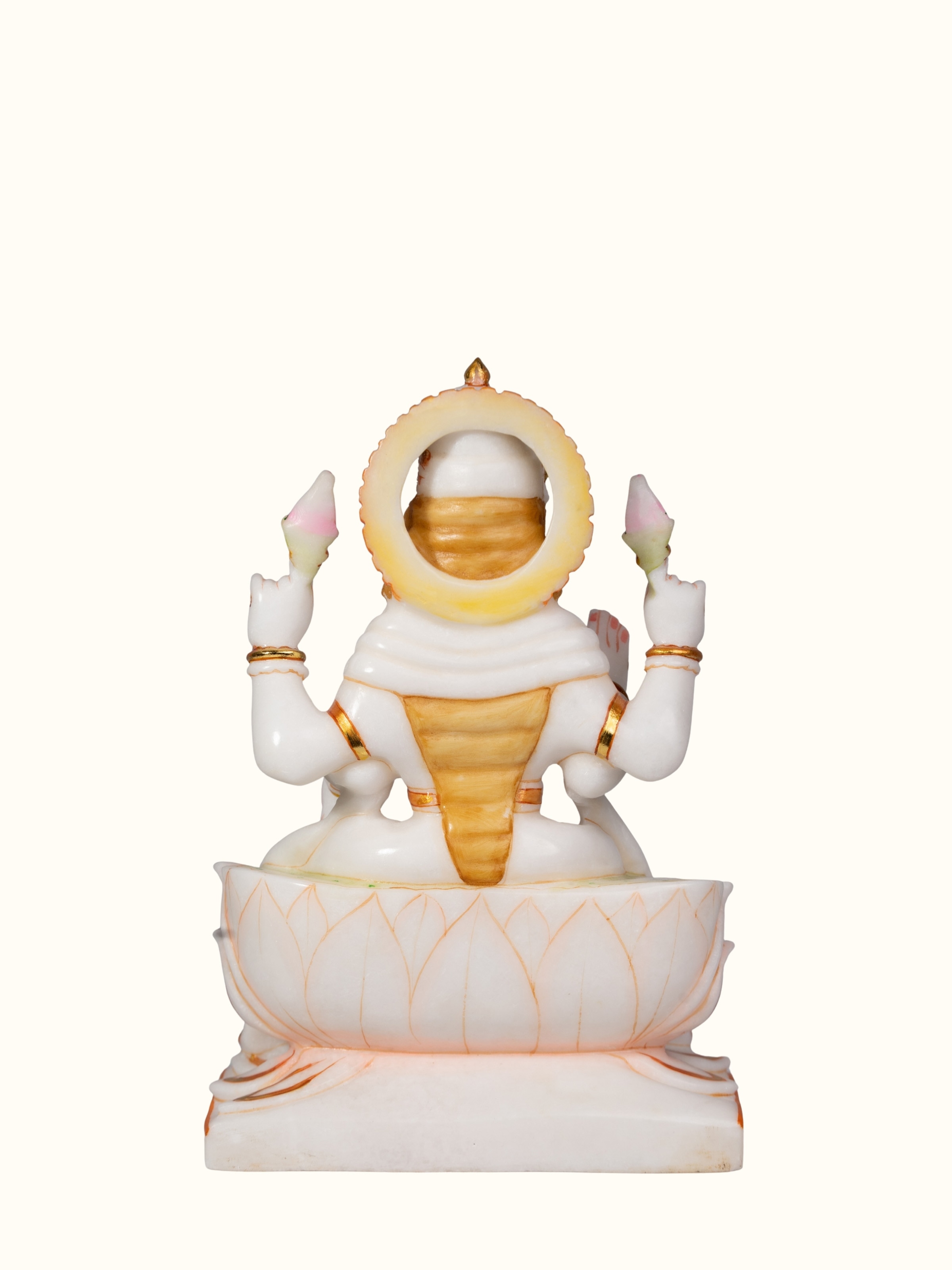 Bottom view of carved marble Lakshmi idol showing base detail