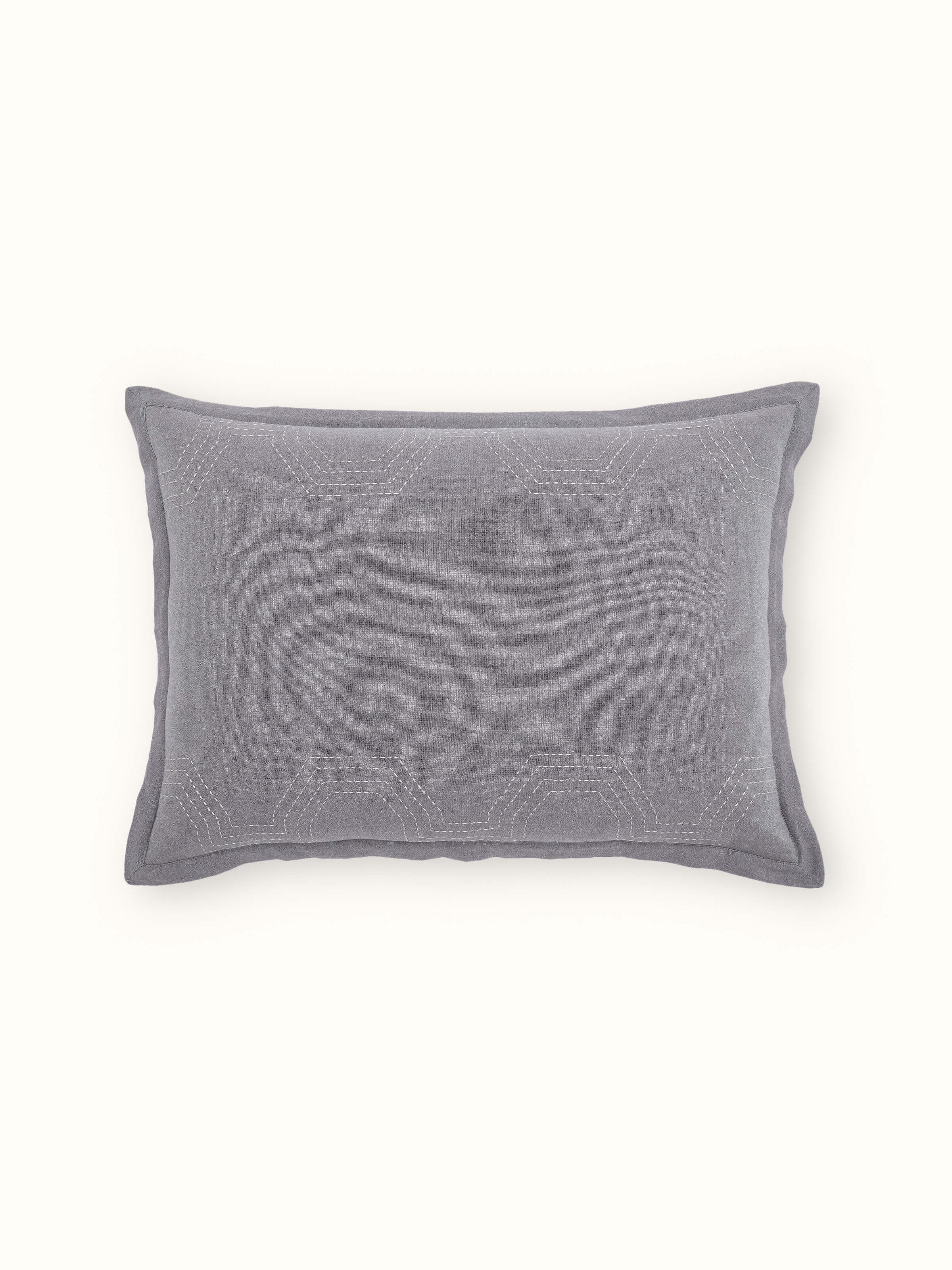 Close-up emphasizing the fine hand-embroidered Kantha patterns