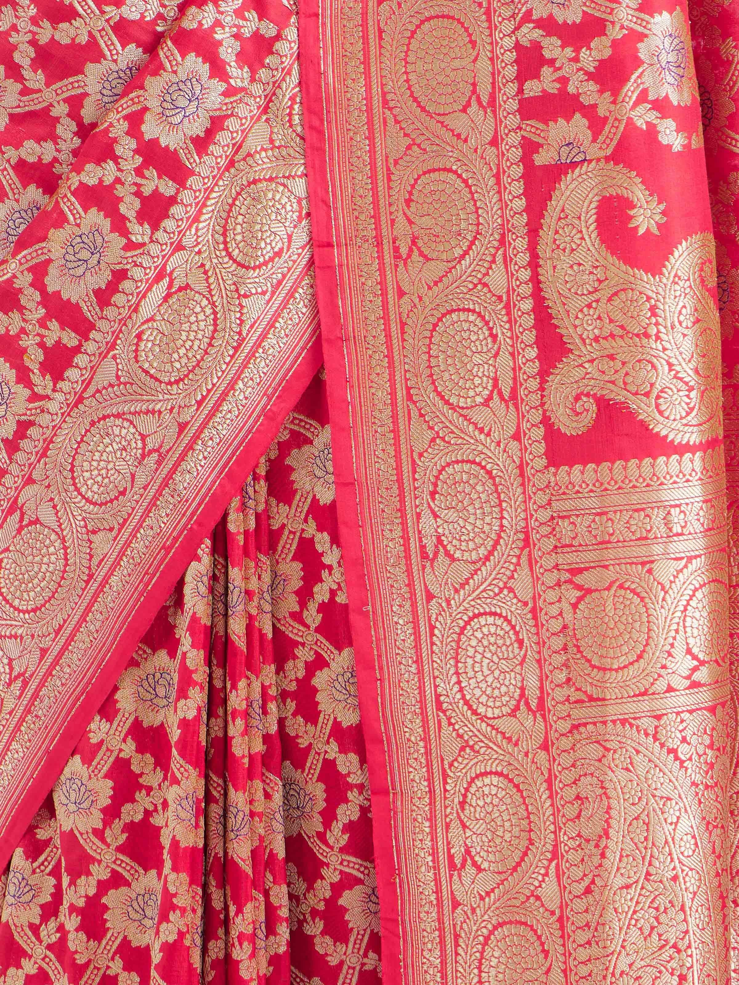 Detail view of red mulberry katan silk Banarasi saree highlighting fabric texture and zari weave