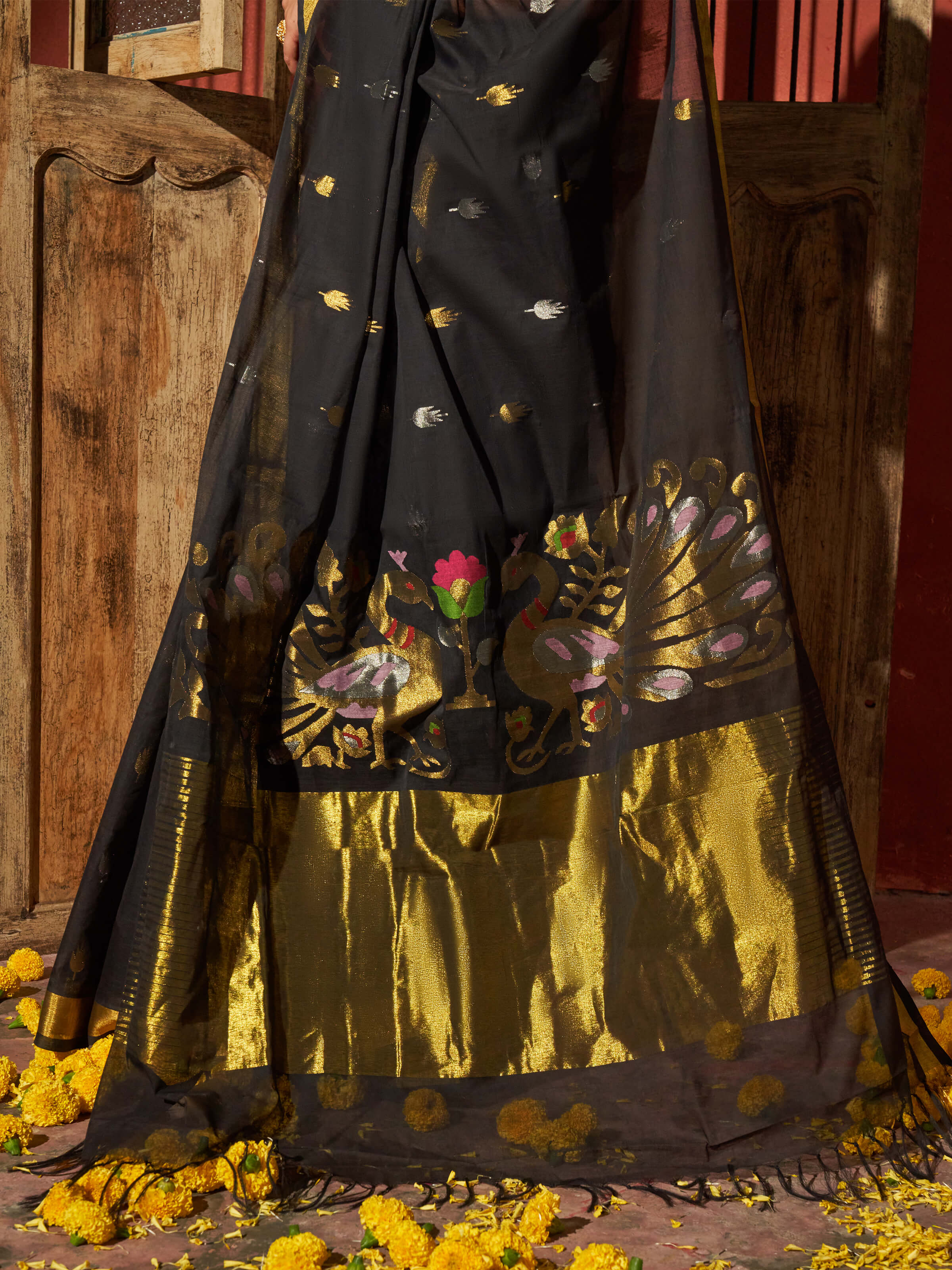 Detail view of black cotton Venkatagiri saree showing lightweight texture and craftsmanship