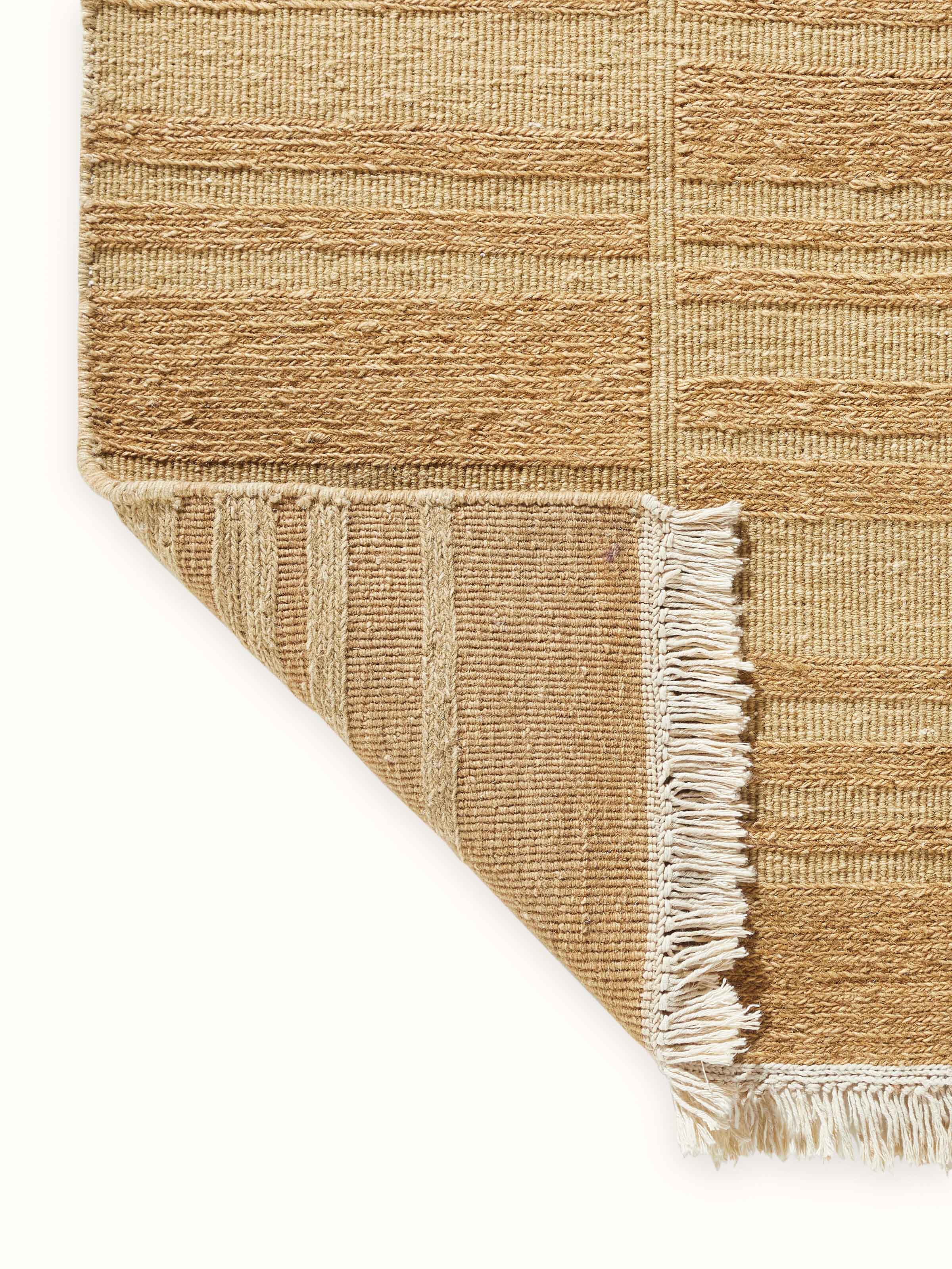 Back view of Lawan Wool Dhurrie showing edge binding and durable flatweave construction.