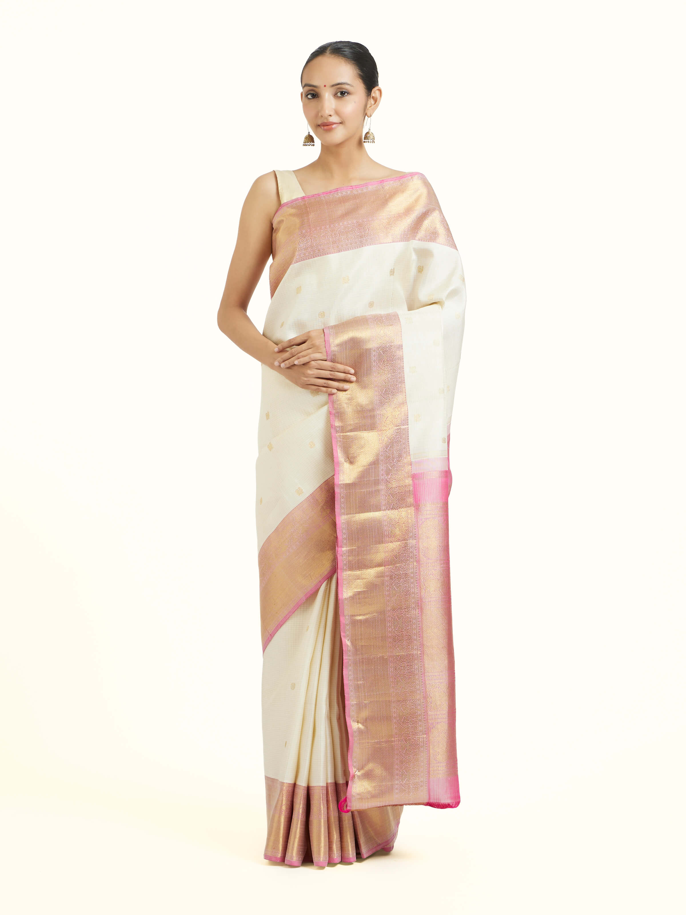 Front view of off-white silk Kancheepuram saree with rich woven zari border