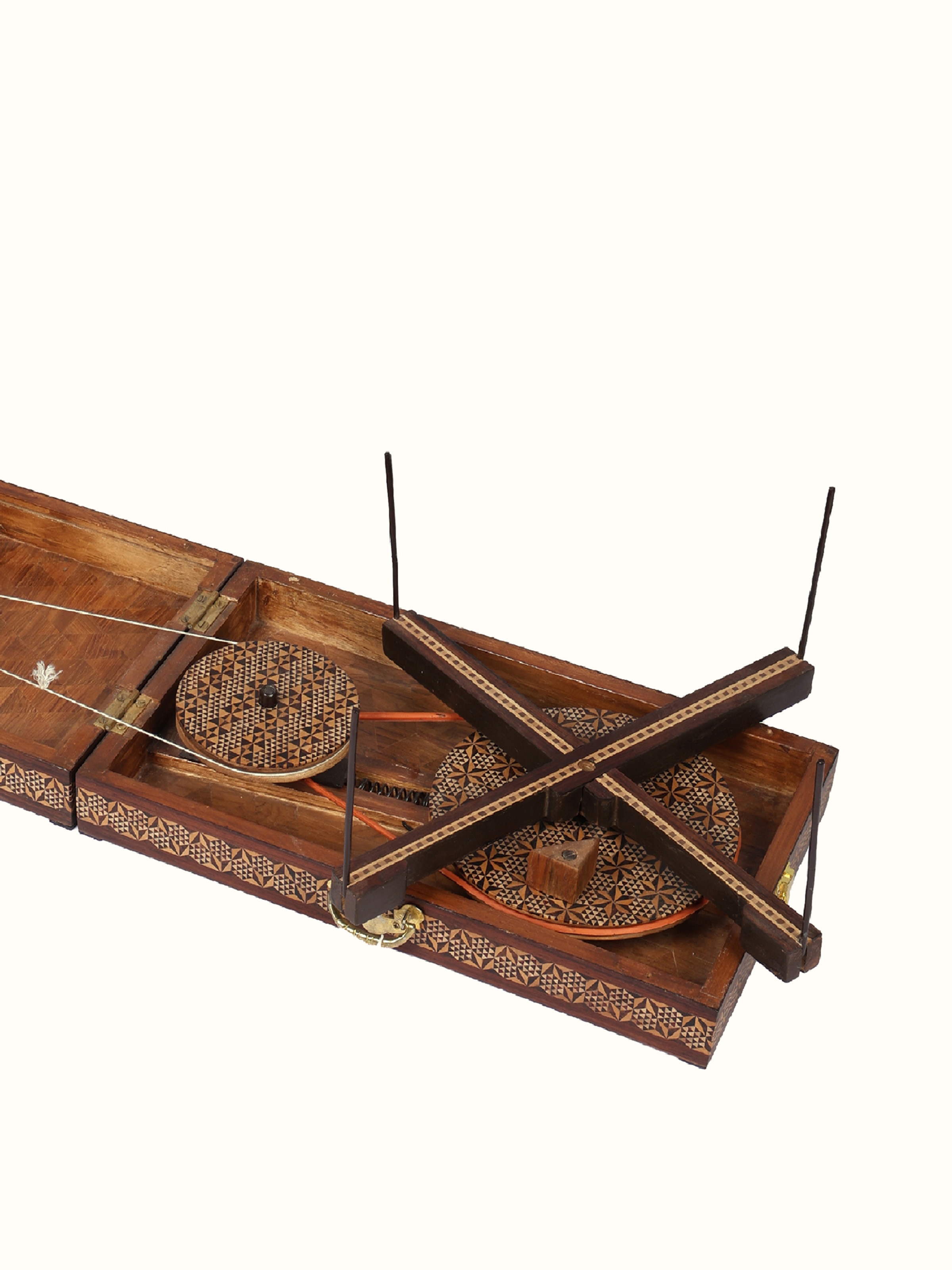 Full view of marquetry rosewood charkha with carved structure