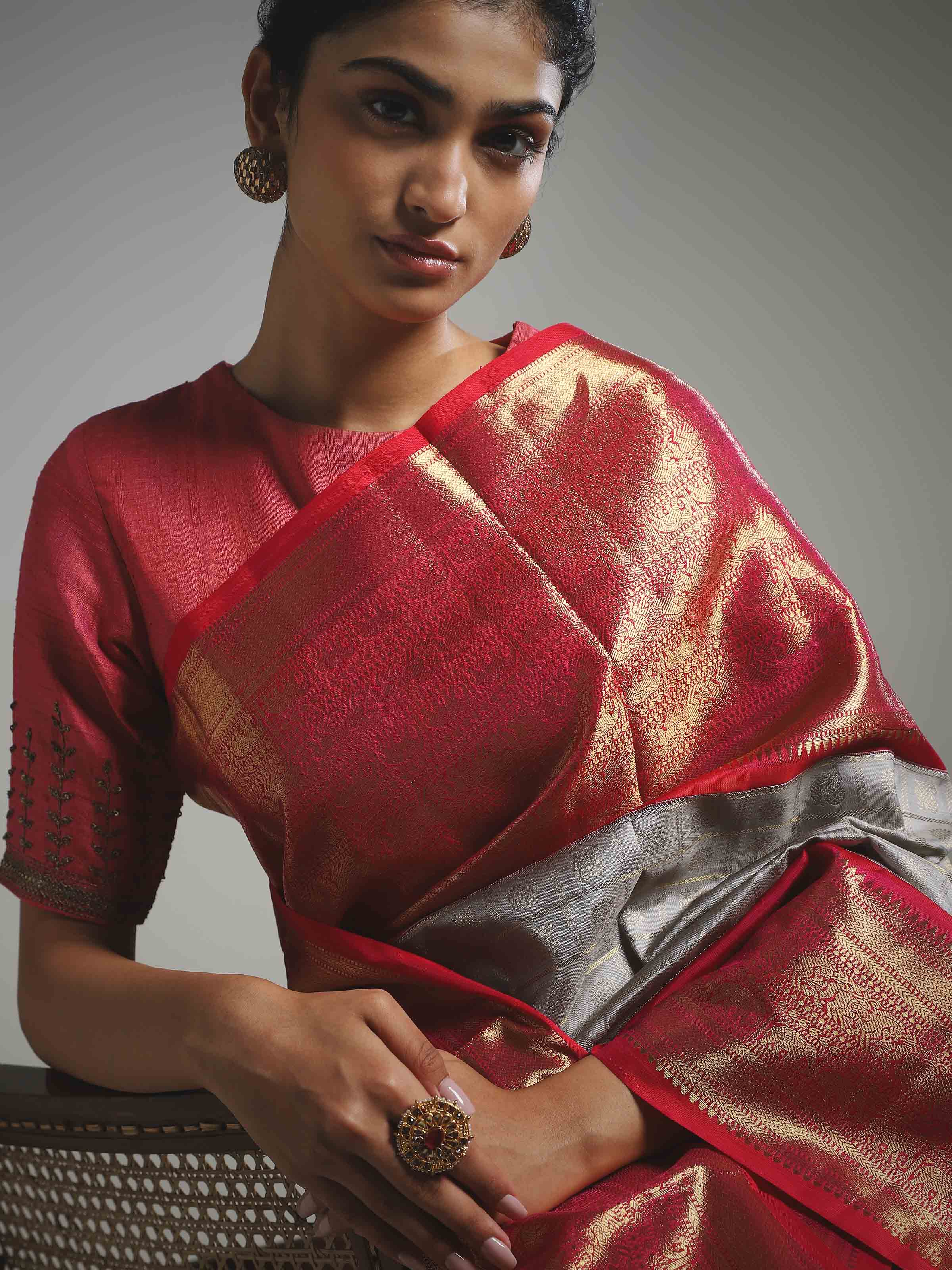 Detail view of grey silk Kancheepuram saree showing silk texture and zari work