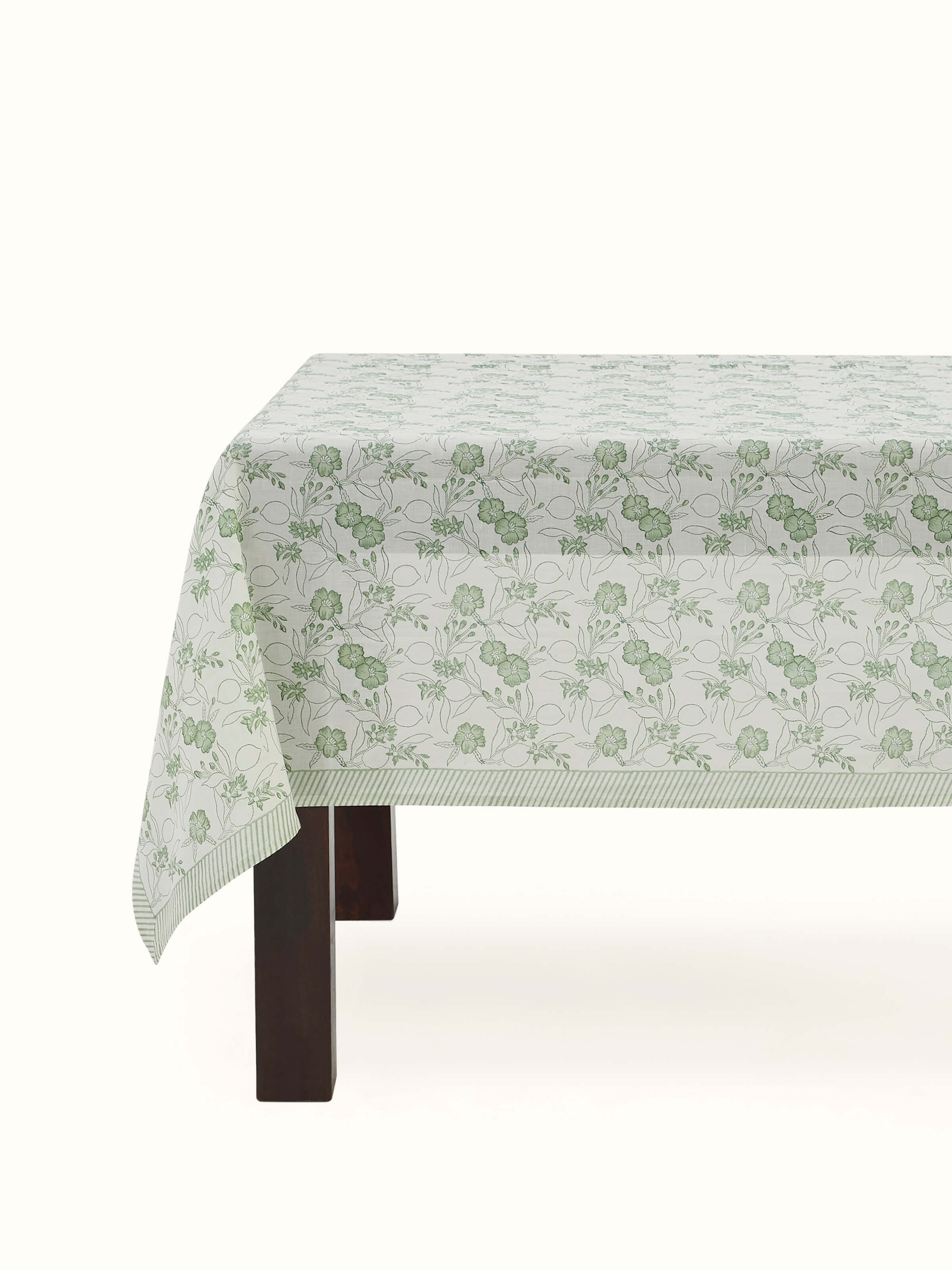 Front view showing the green floral Sanganeri hand block print on cotton linen table cover, perfect for 6 seater tables