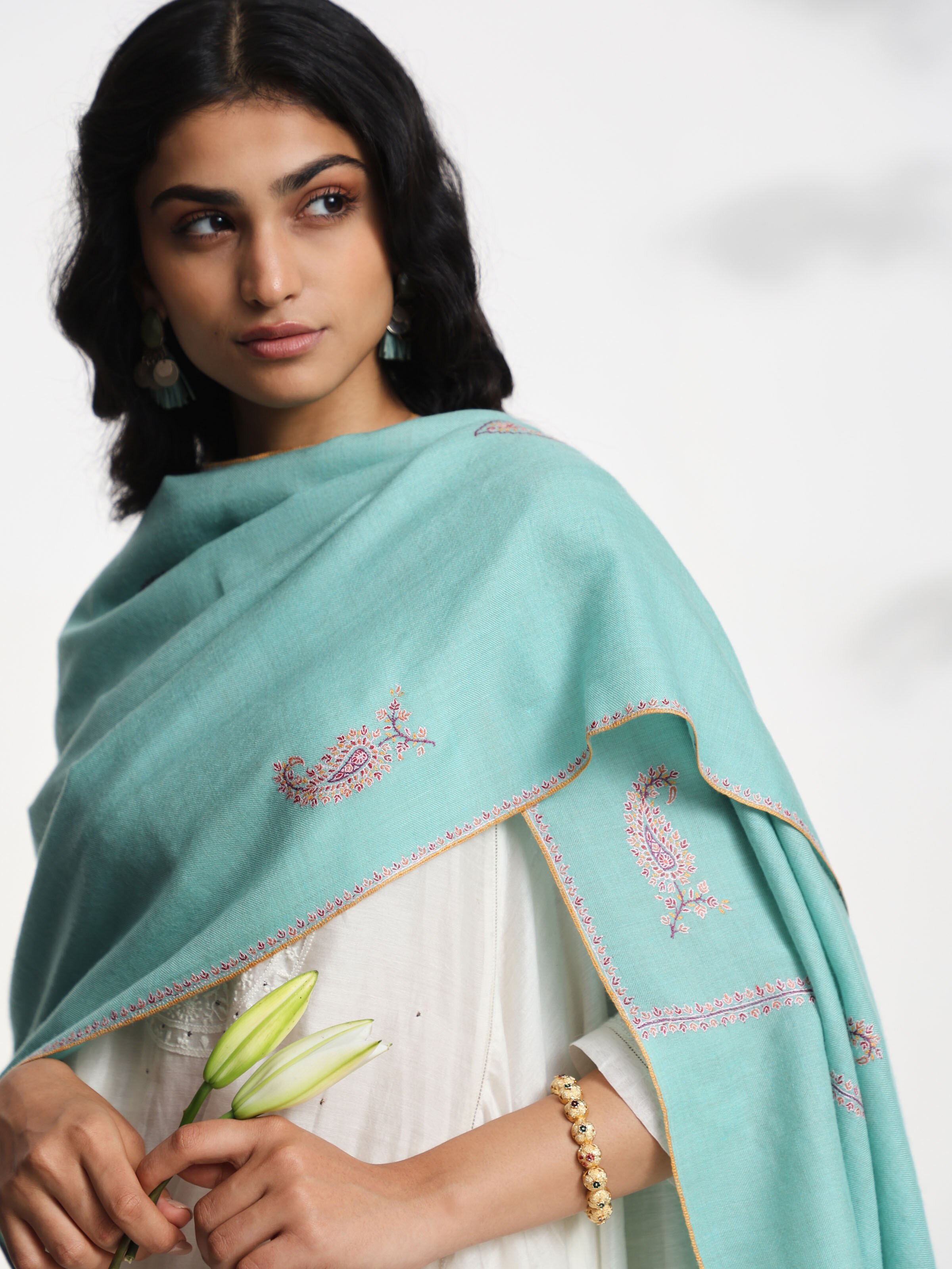 Detail view of rust jalidar sozni embroidered stole showing embroidery craftsmanship