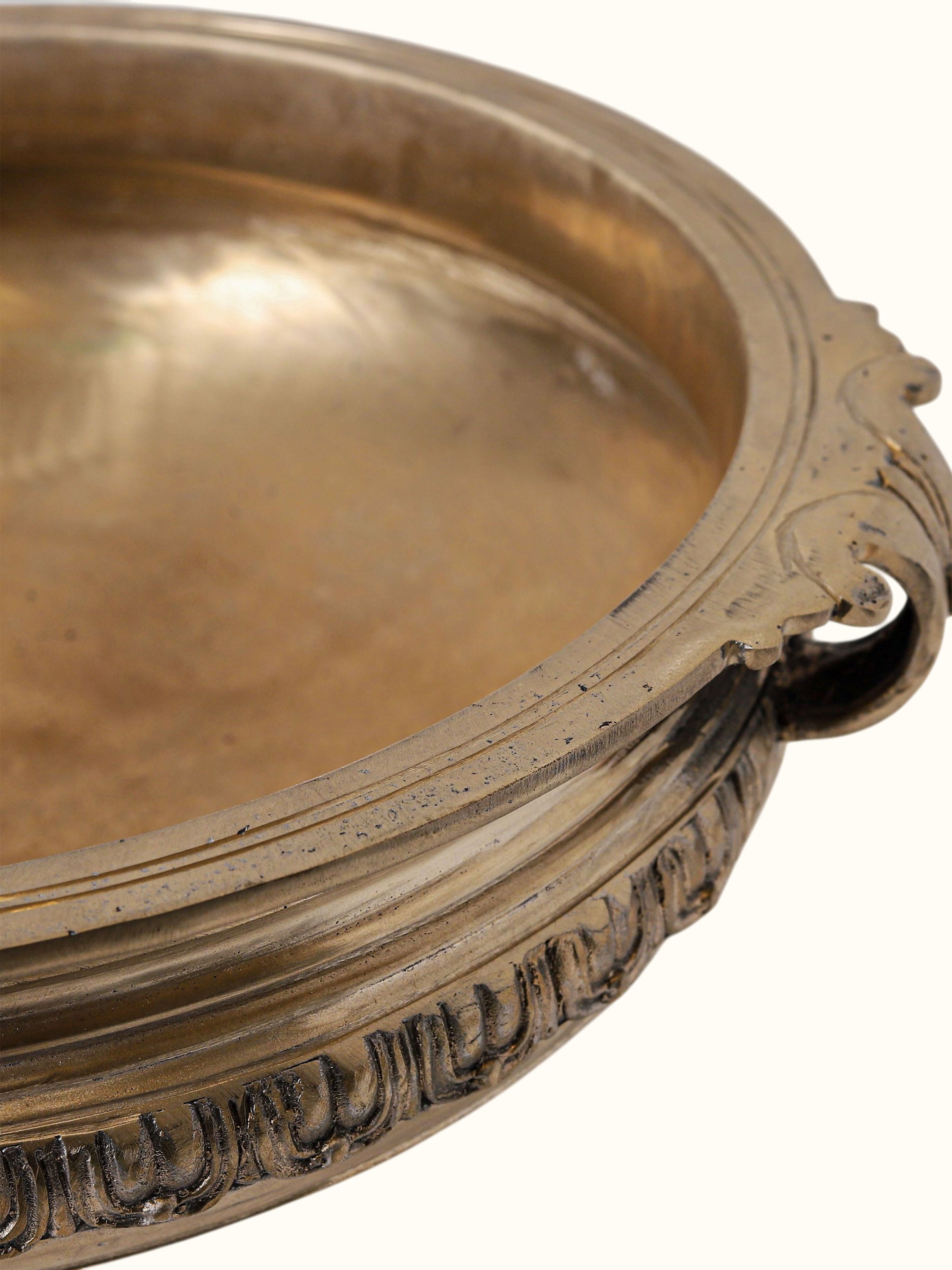 close-up view of bronze casting brass urli craftsmanship