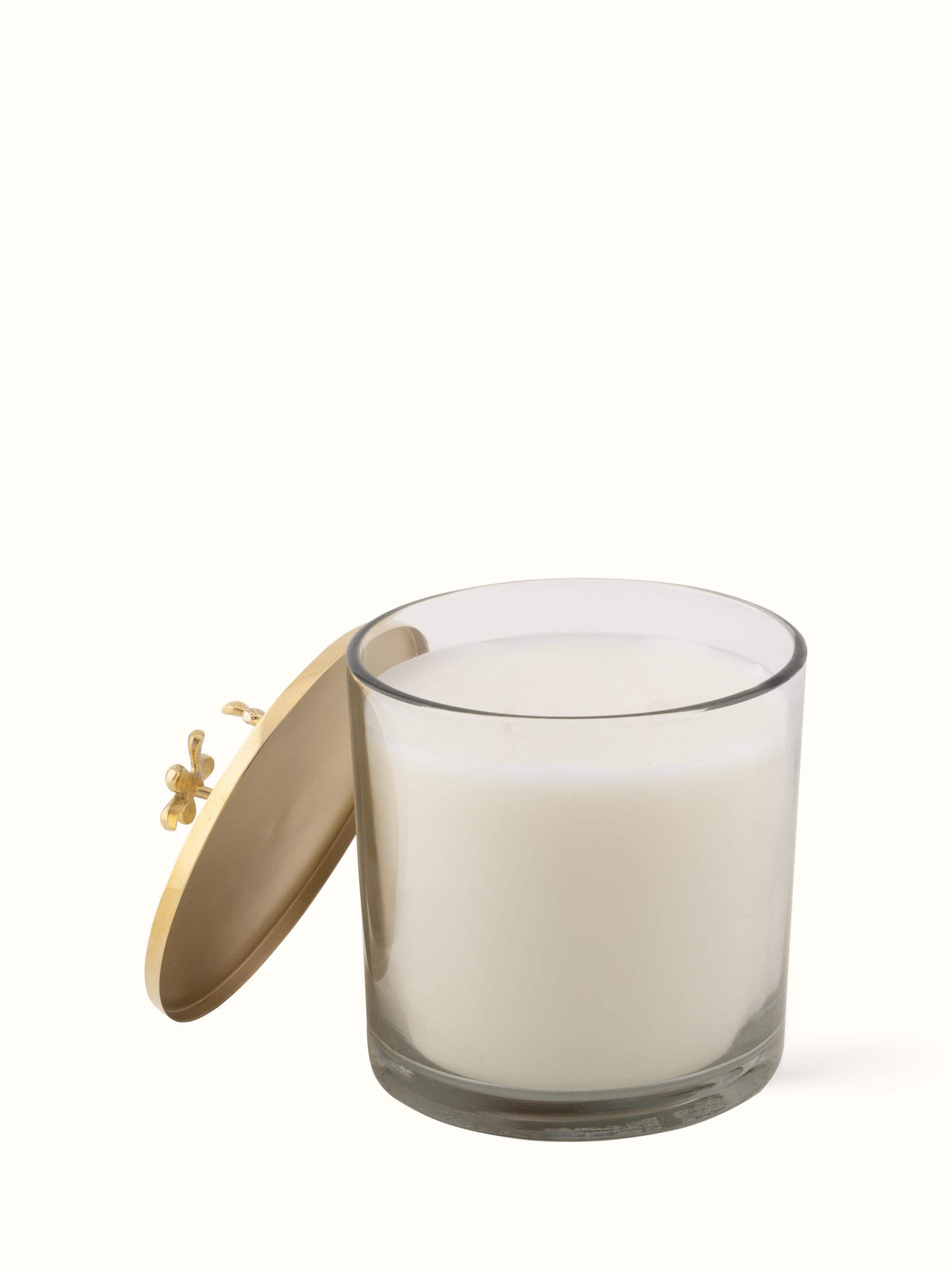 Front view of Brass Candle showcasing intricate design and warm golden tones